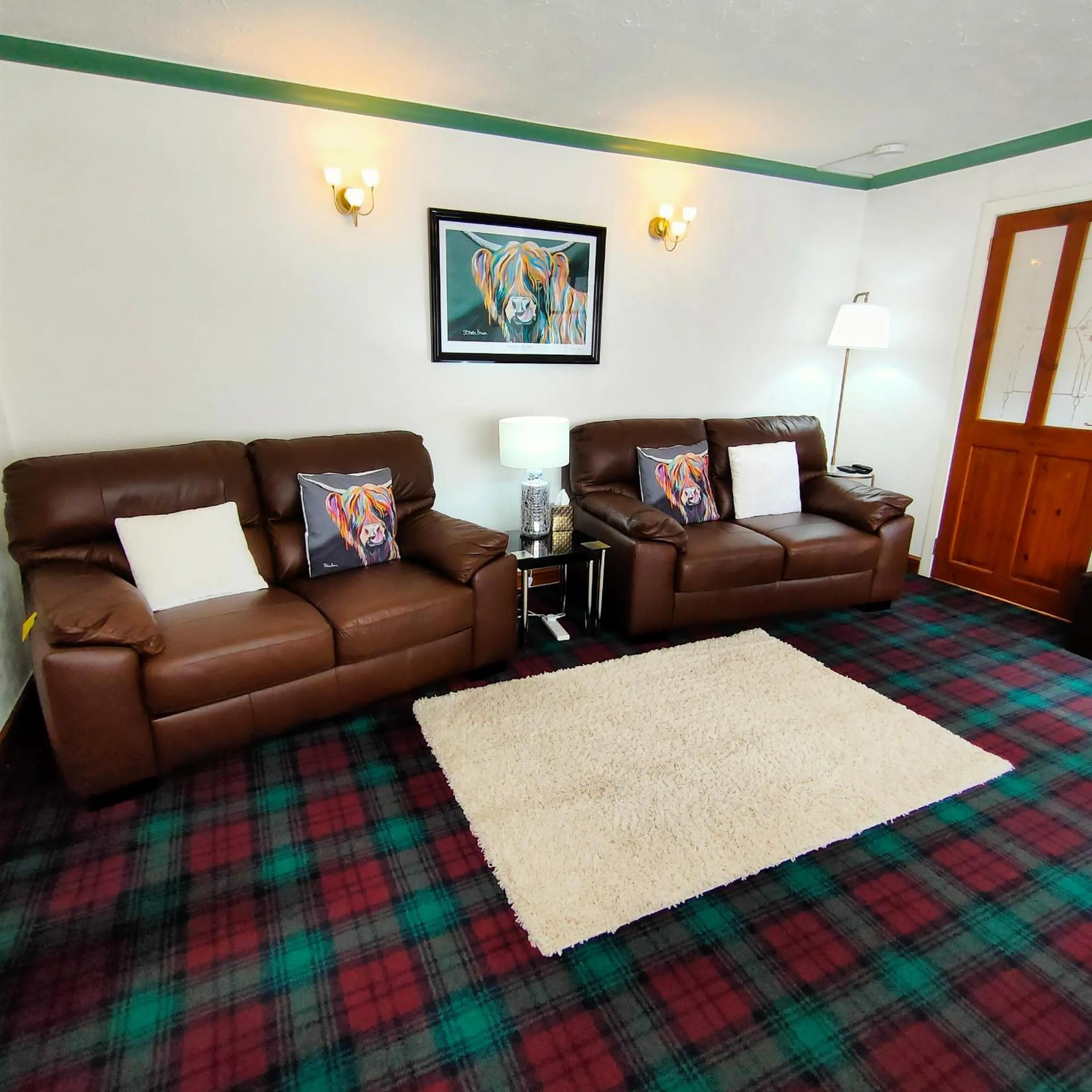 Living room in The Old Smiddy Cottage and Apartment