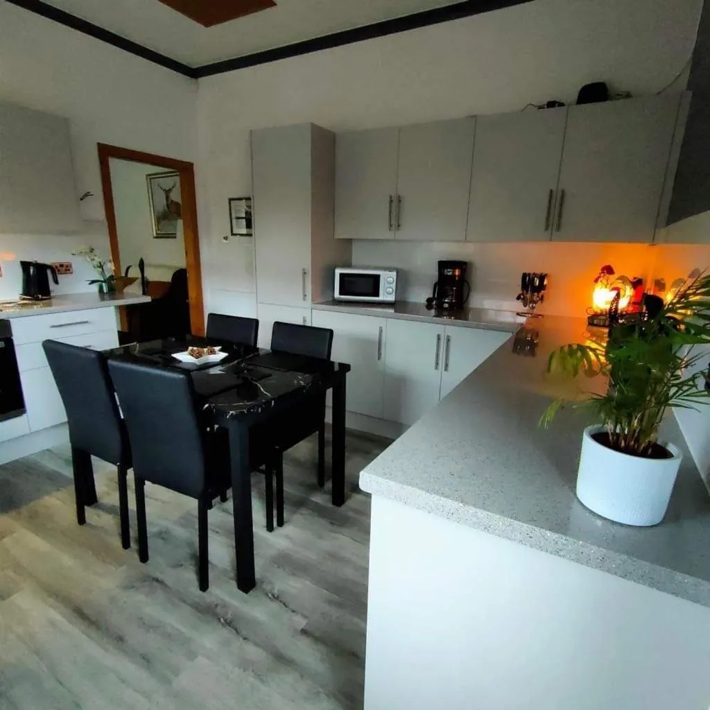 Kitchen or kitchenette in The Old Smiddy Cottage and Apartment