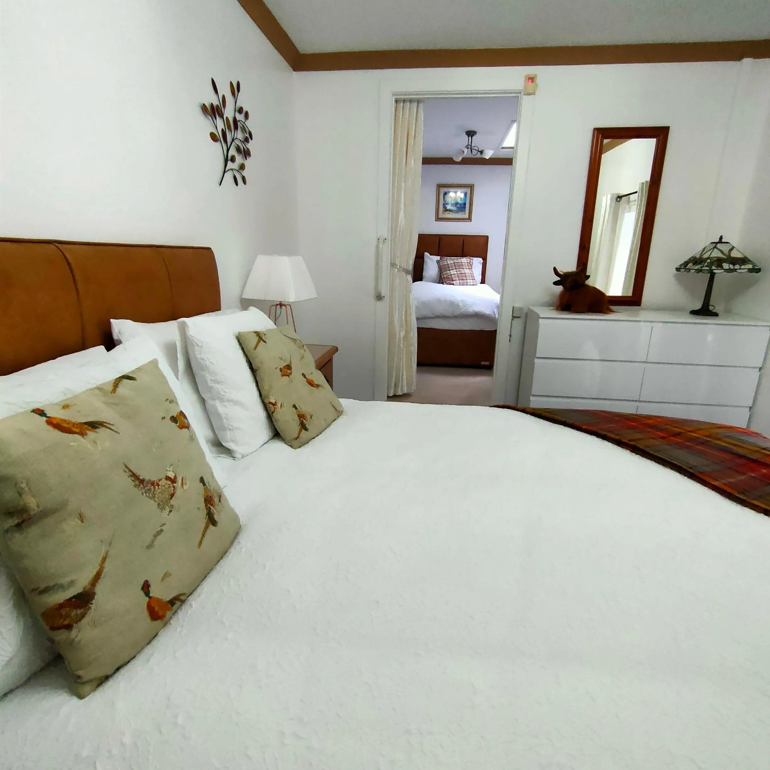 Bedroom, Bed in The Old Smiddy Cottage and Apartment
