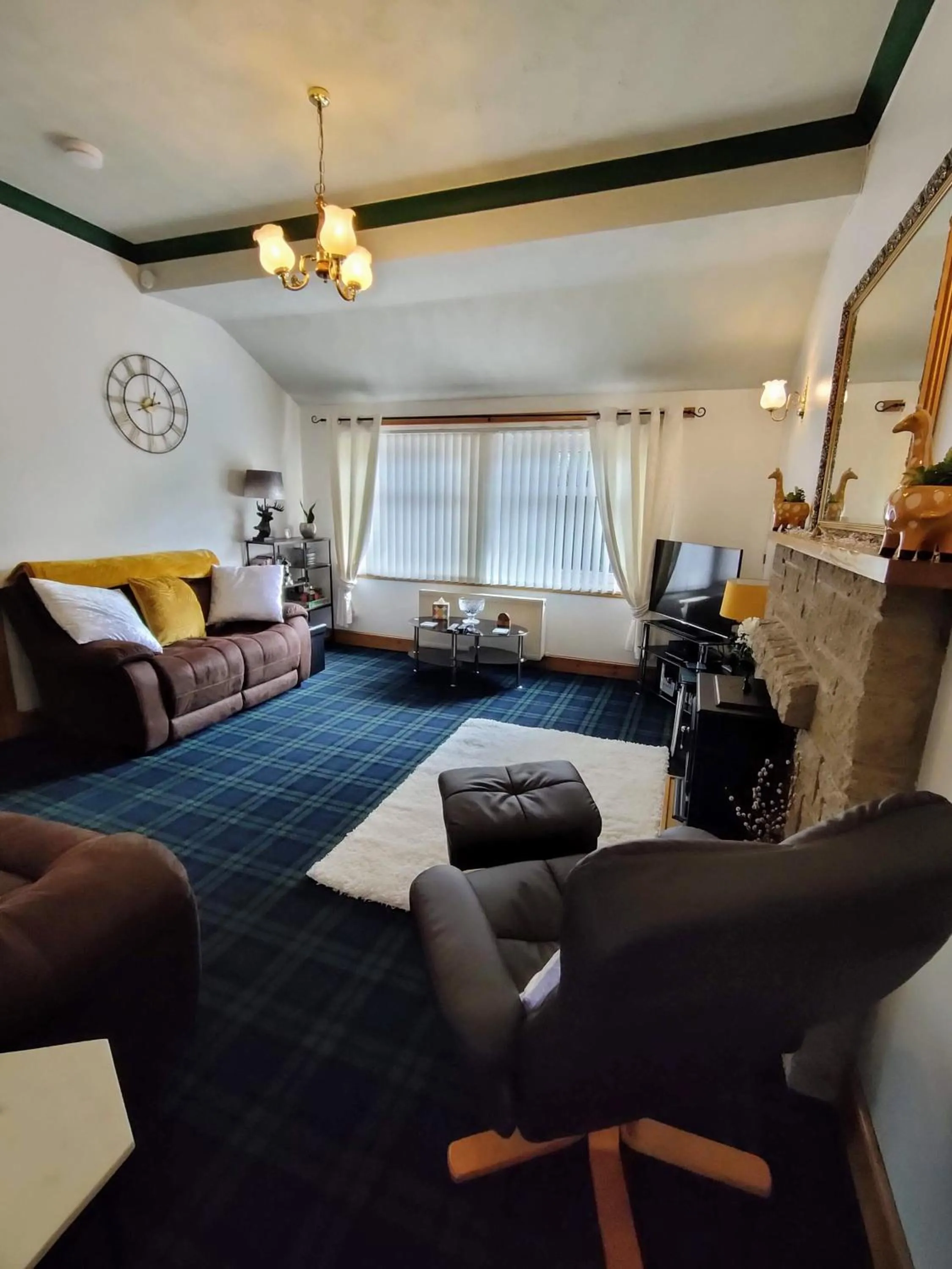 Living room in The Old Smiddy Cottage and Apartment