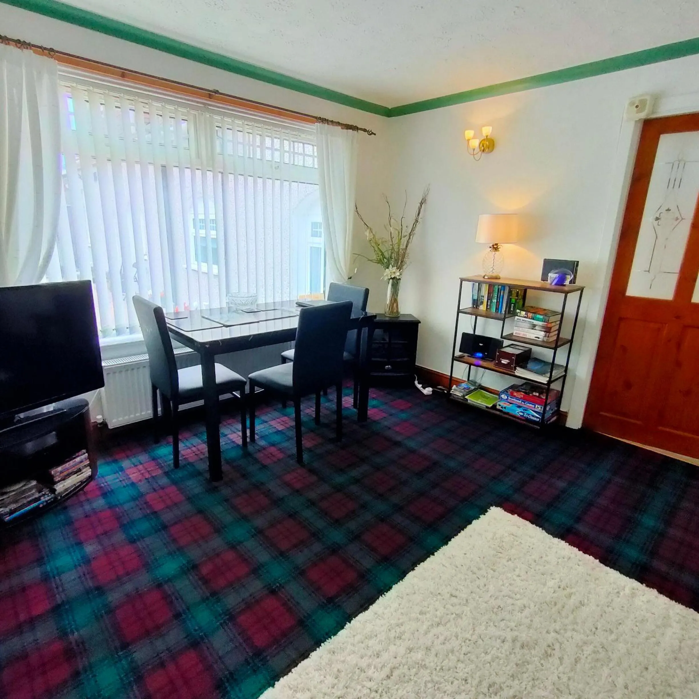Dining area in The Old Smiddy Cottage and Apartment