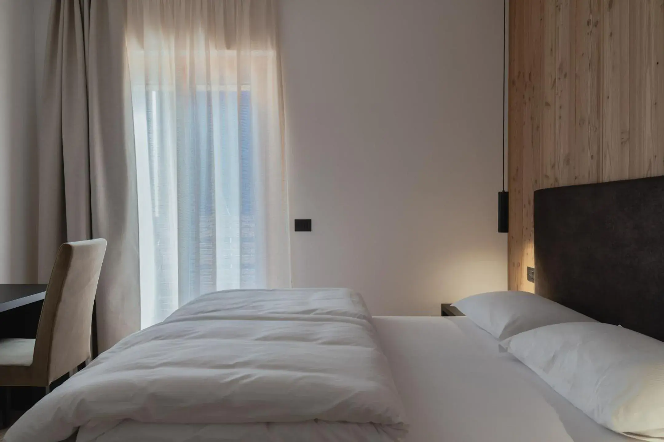 Quadruple Room in Hotel Chalet Rezia Quadruple Room in Hotel Chalet Rezia