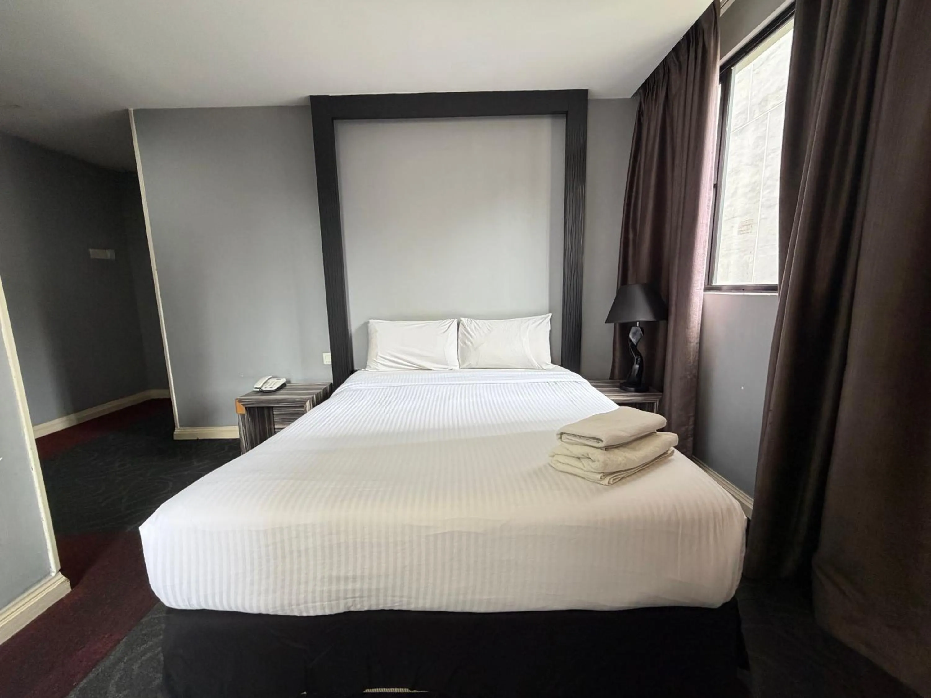 Bed in Asto Hotel Kuala Lumpur