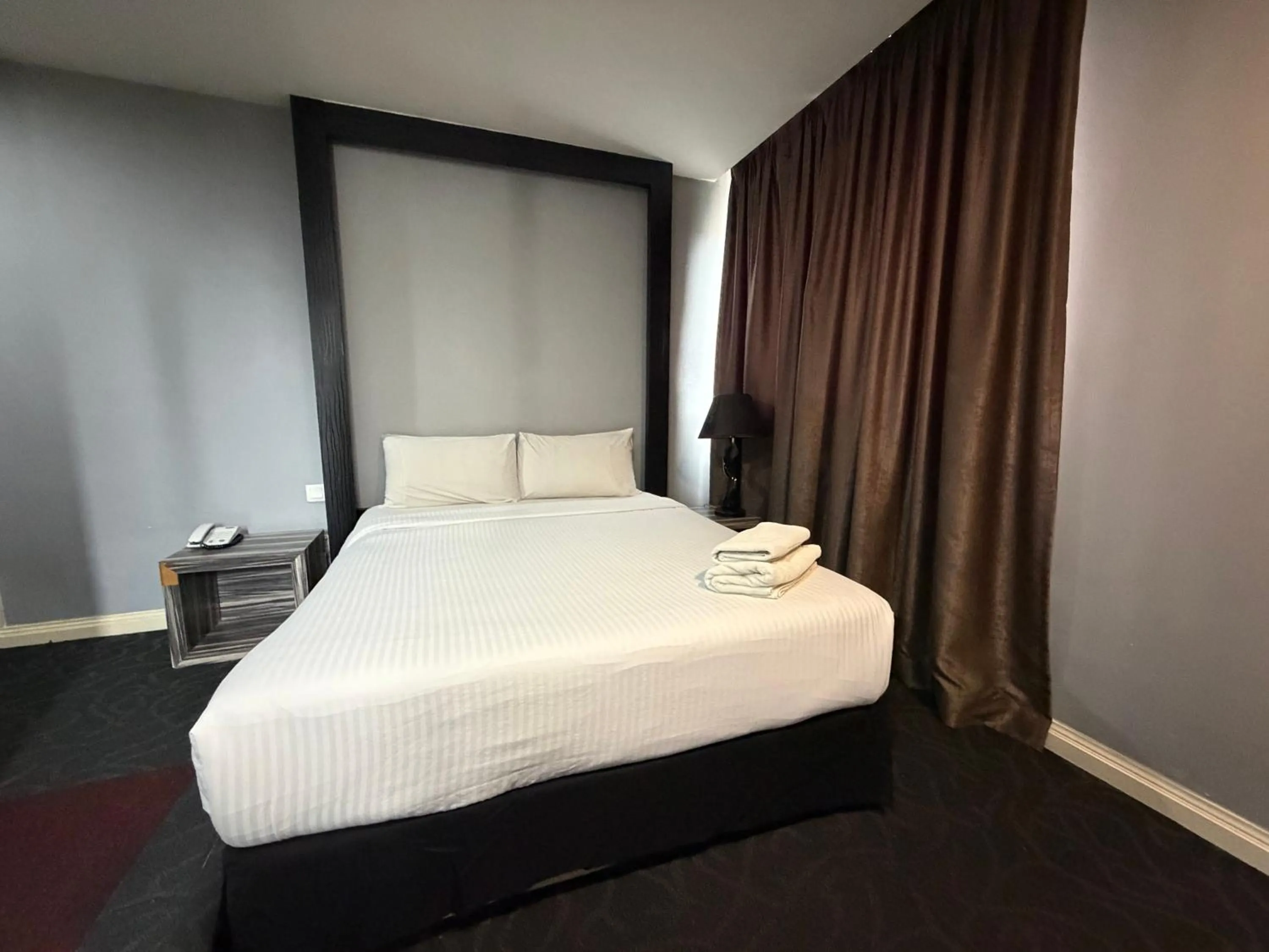 Bed in Asto Hotel Kuala Lumpur