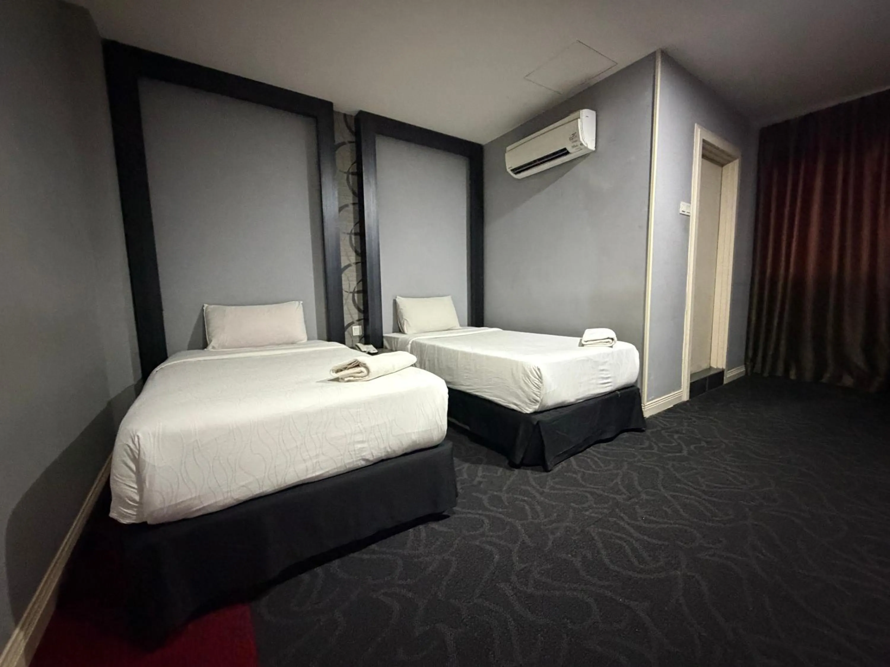 Bed in Asto Hotel Kuala Lumpur