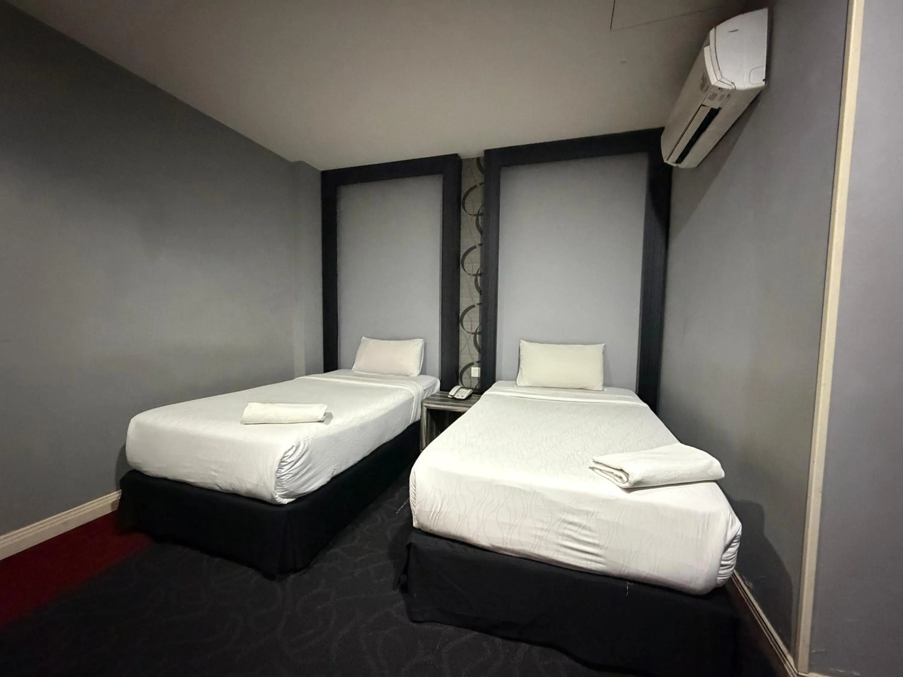 Bed in Asto Hotel Kuala Lumpur