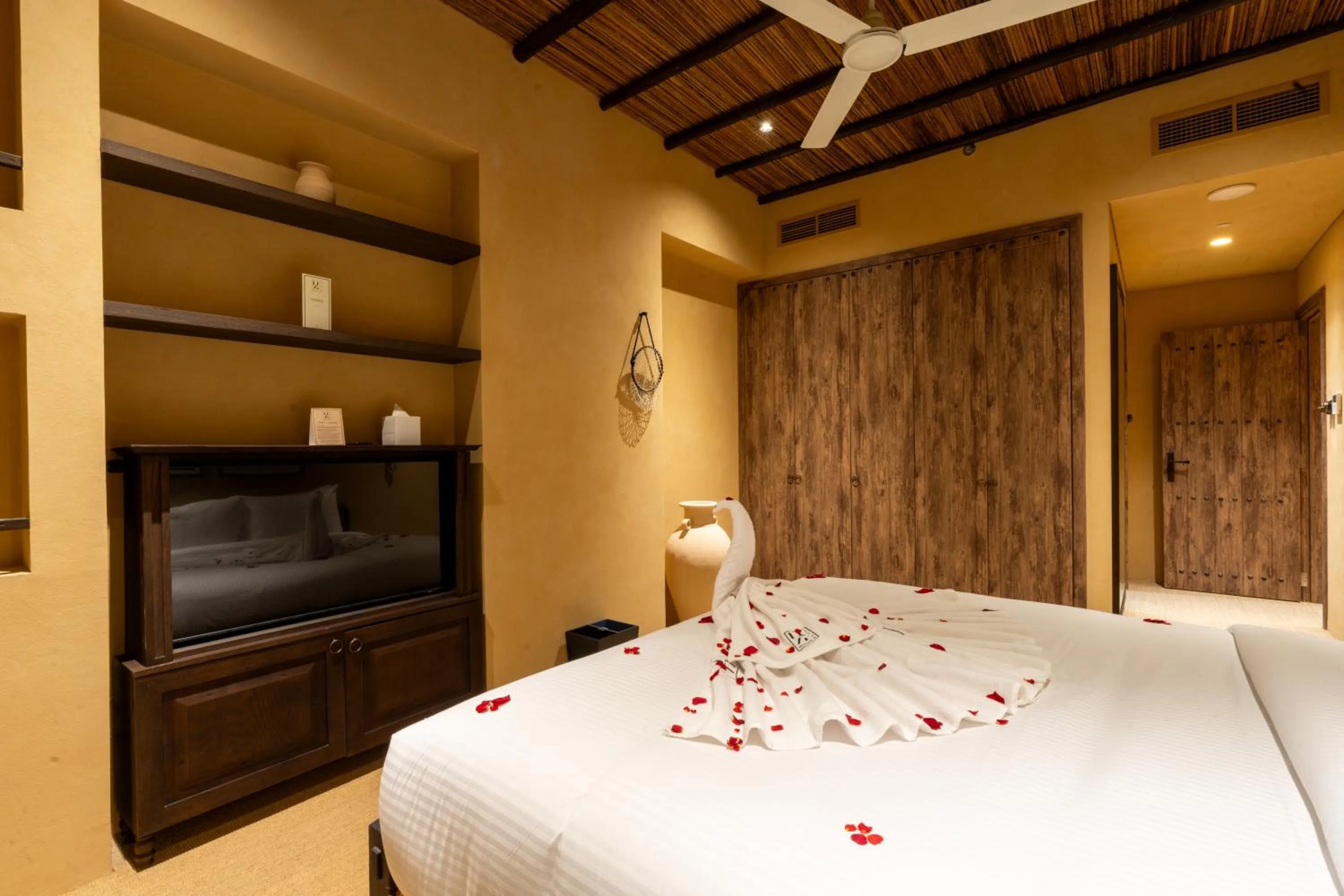 Bed in The Luxe Retreat Hotel Apartments