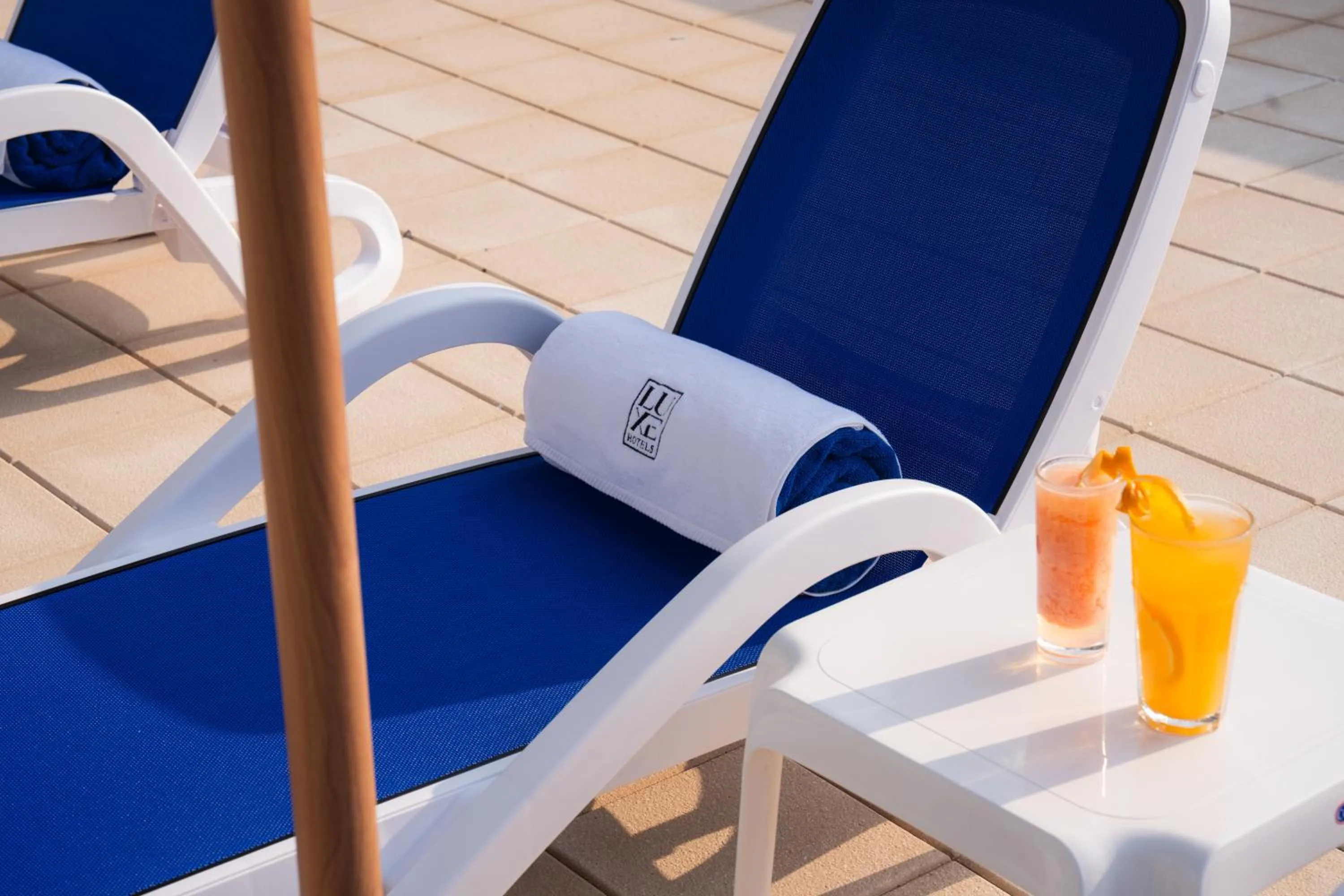 Swimming pool in The Luxe Retreat Hotel Apartments