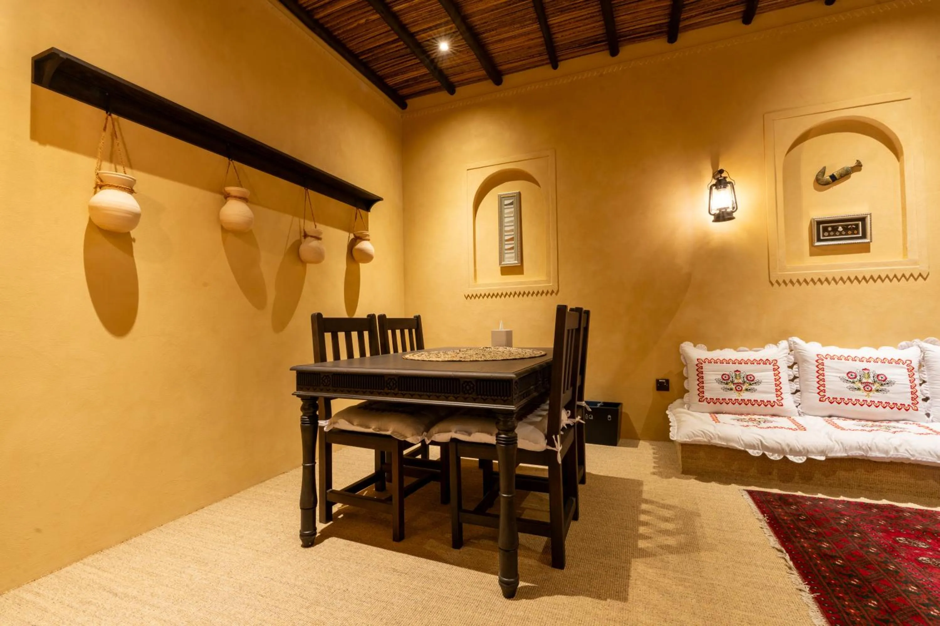 Living room, Bed in The Luxe Retreat Hotel Apartments