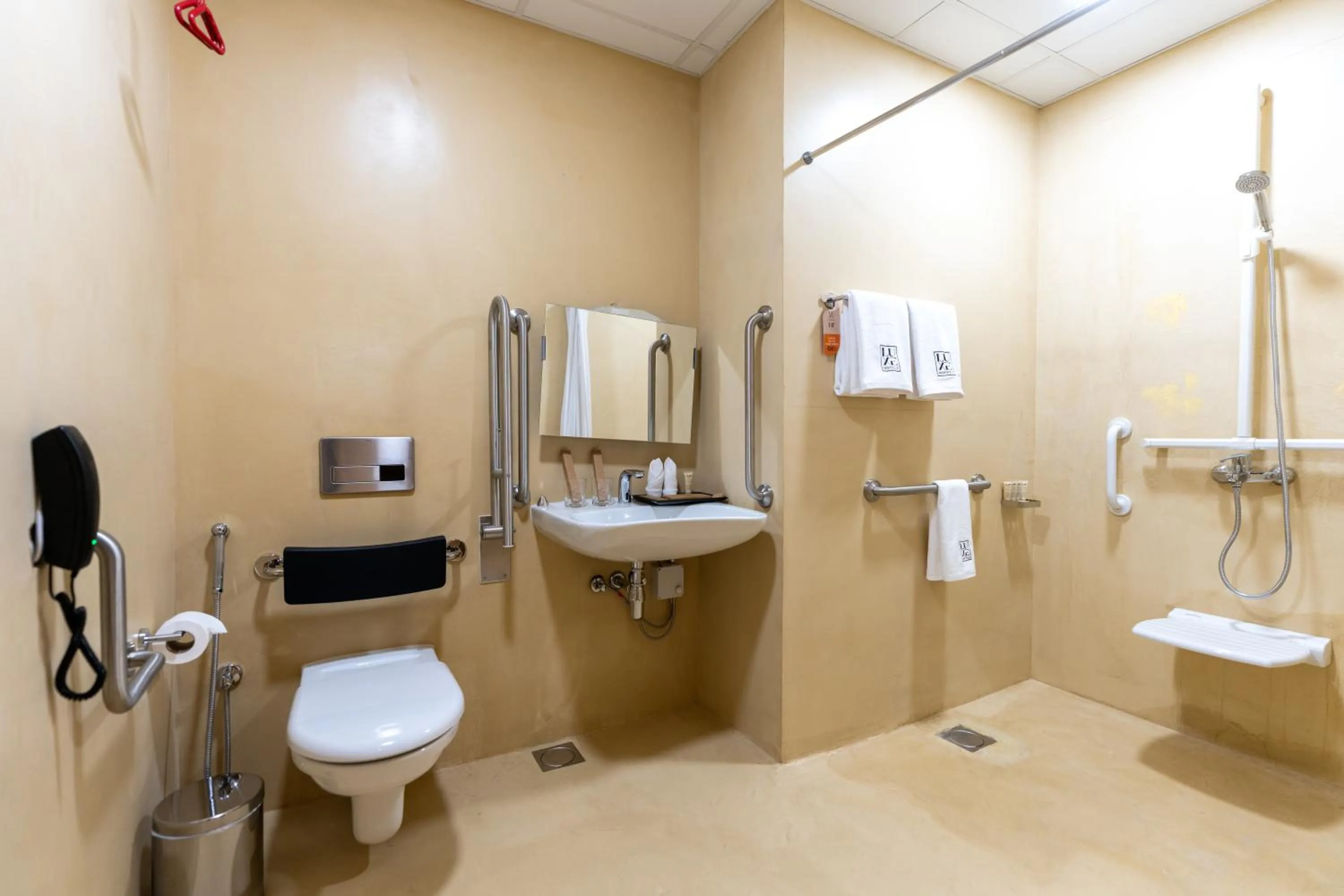 Toilet in The Luxe Retreat Hotel Apartments
