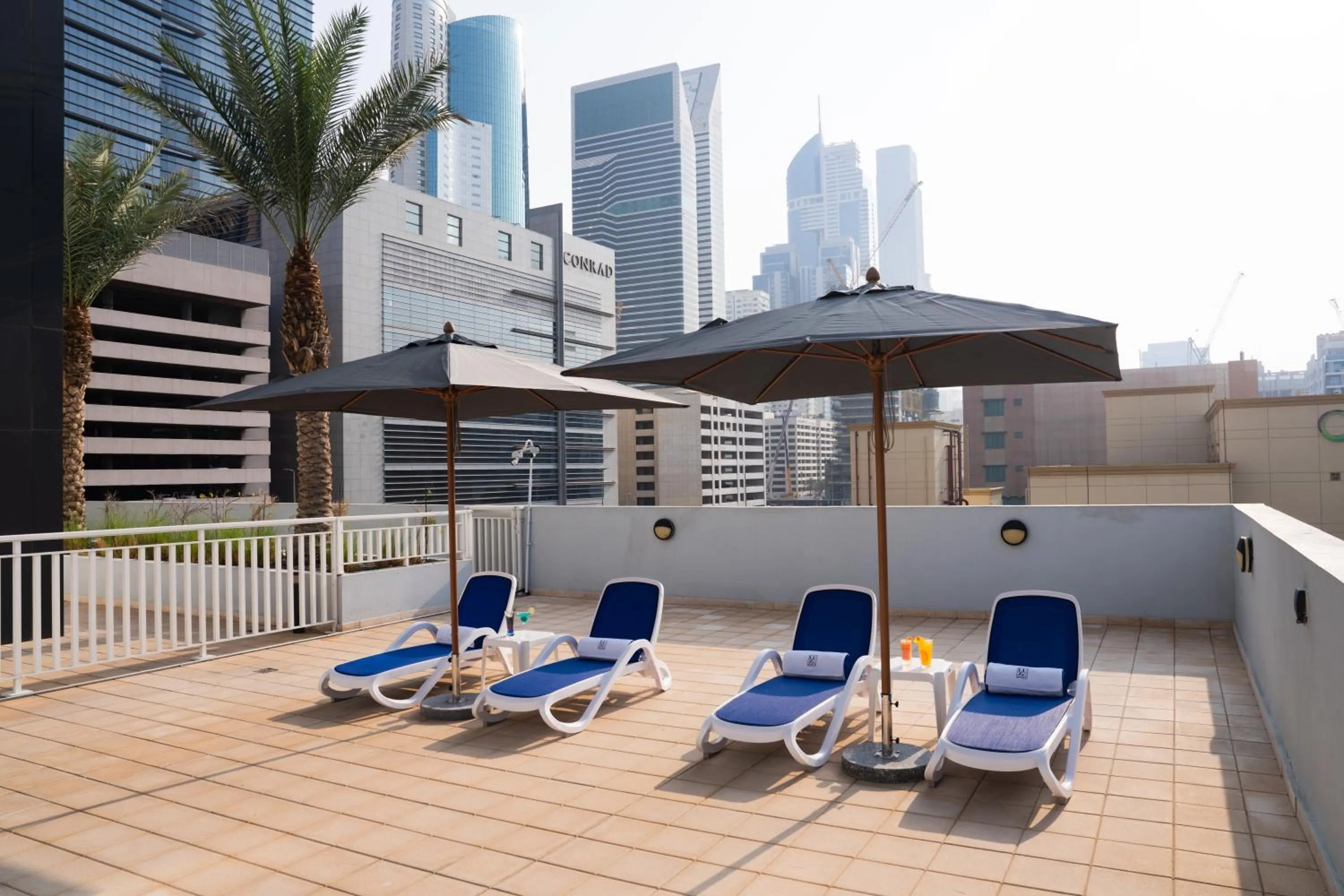 Swimming pool in The Luxe Retreat Hotel Apartments