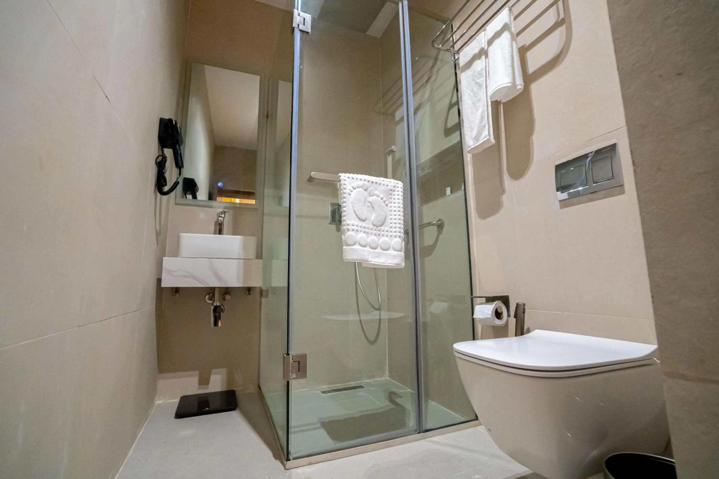 Shower in Greyfield Hotel and Apartments