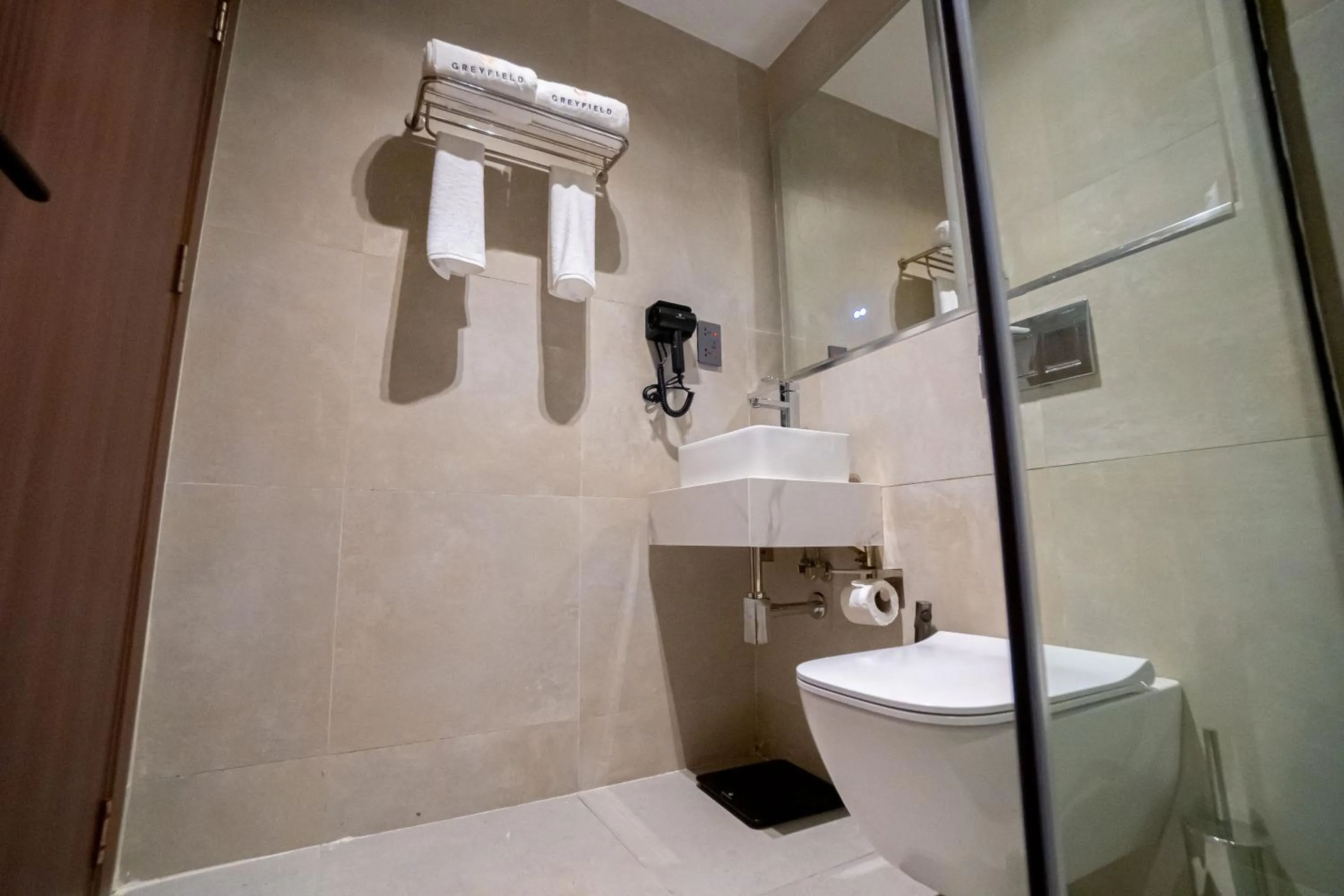 Bathroom in Greyfield Hotel and Apartments