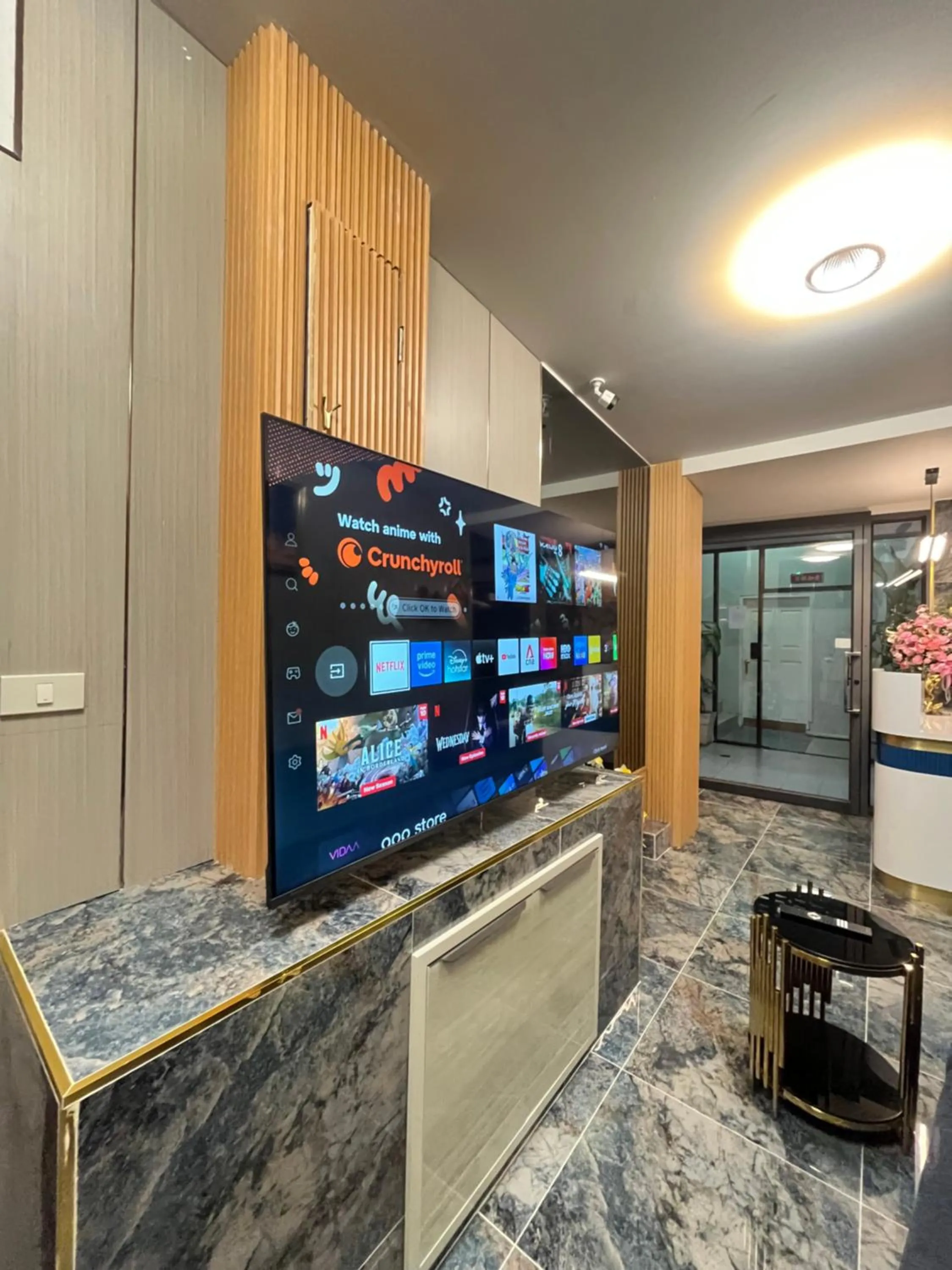 Communal lounge/ TV room in Ali House Patong