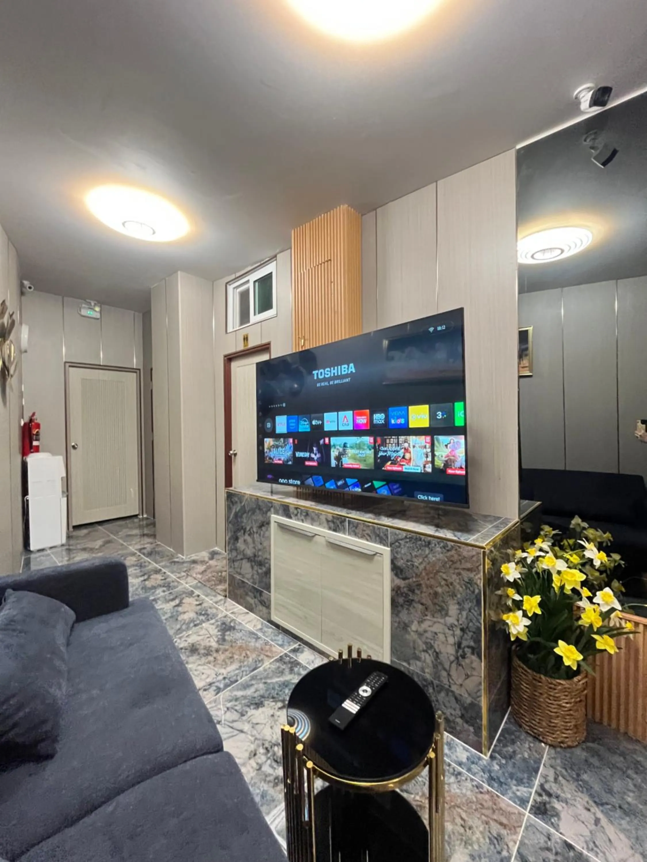 Communal lounge/ TV room in Ali House Patong