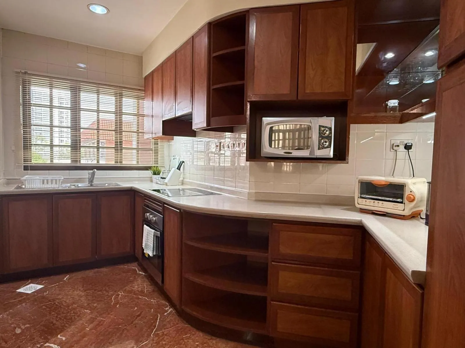 Kitchen or kitchenette in Alocassia Serviced Apartments