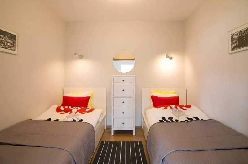 Bed in APARTAMENTY TUŹNIKOWIE