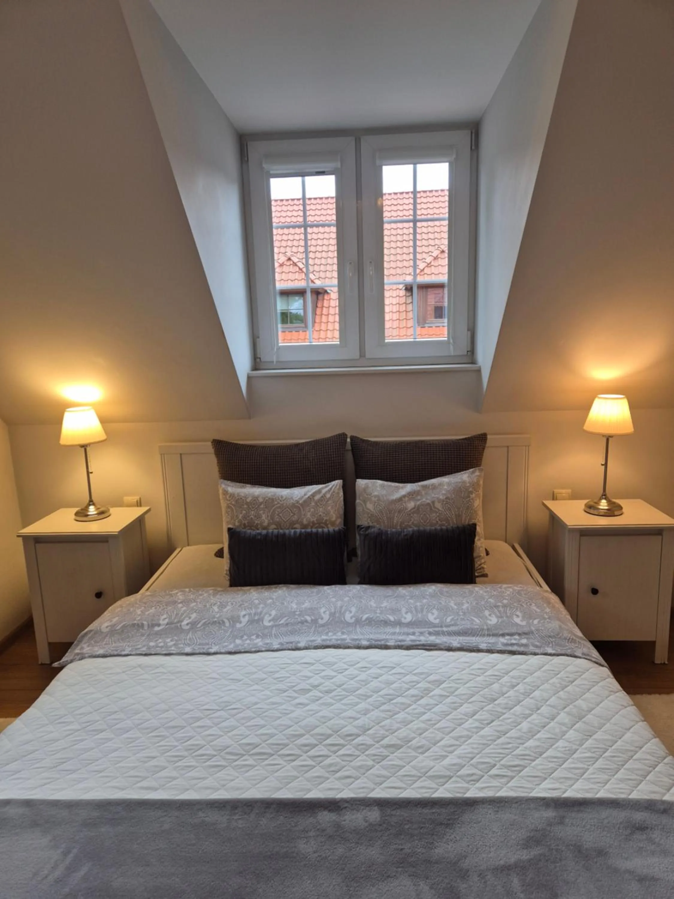 Bed in APARTAMENTY TUŹNIKOWIE