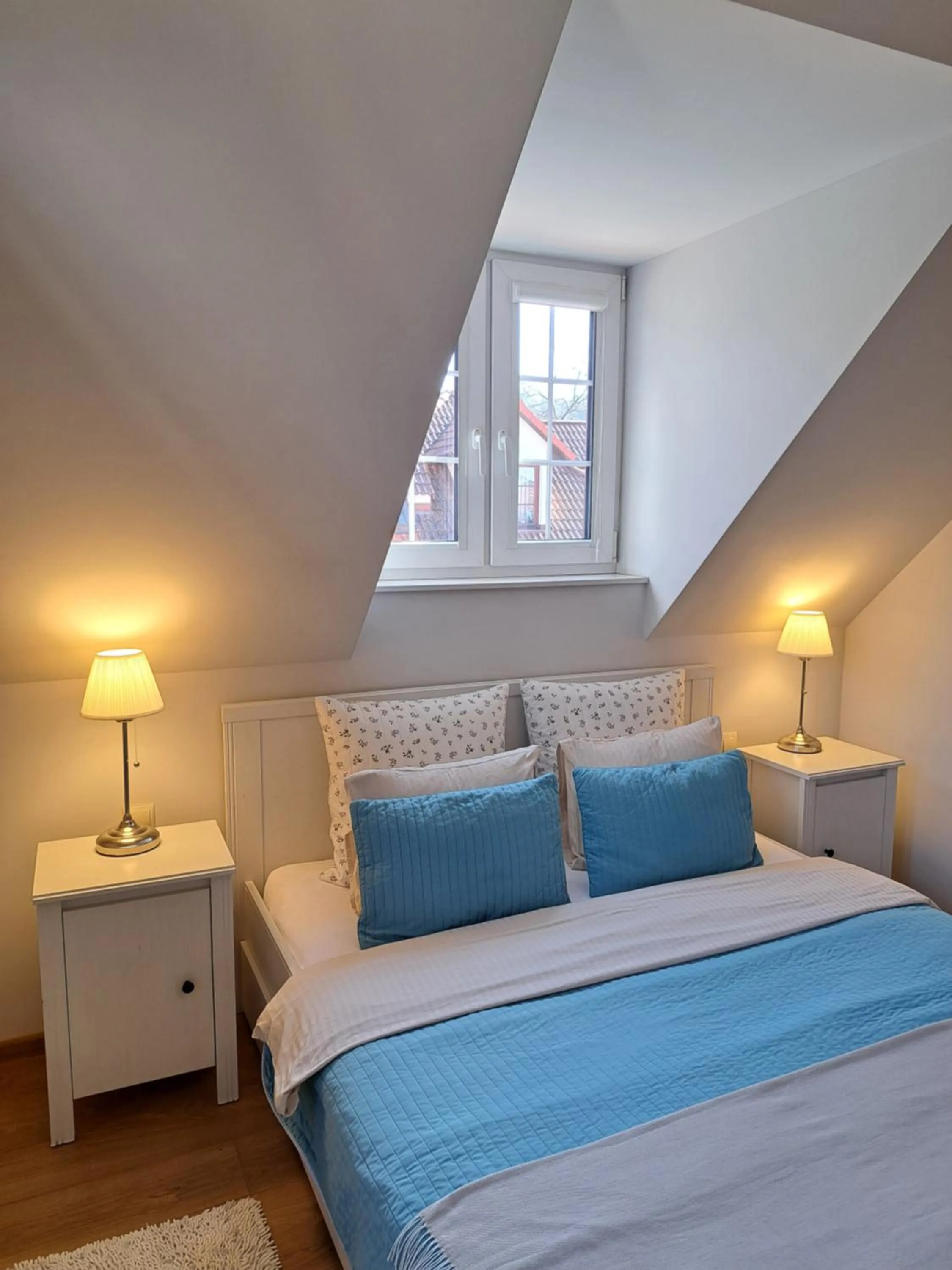 Bed in APARTAMENTY TUŹNIKOWIE