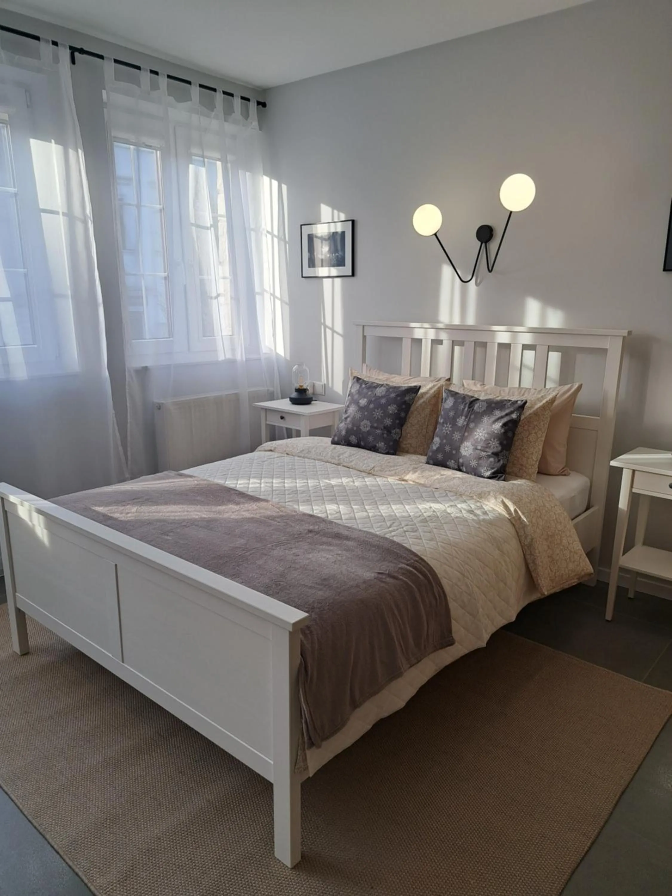 Bed in APARTAMENTY TUŹNIKOWIE