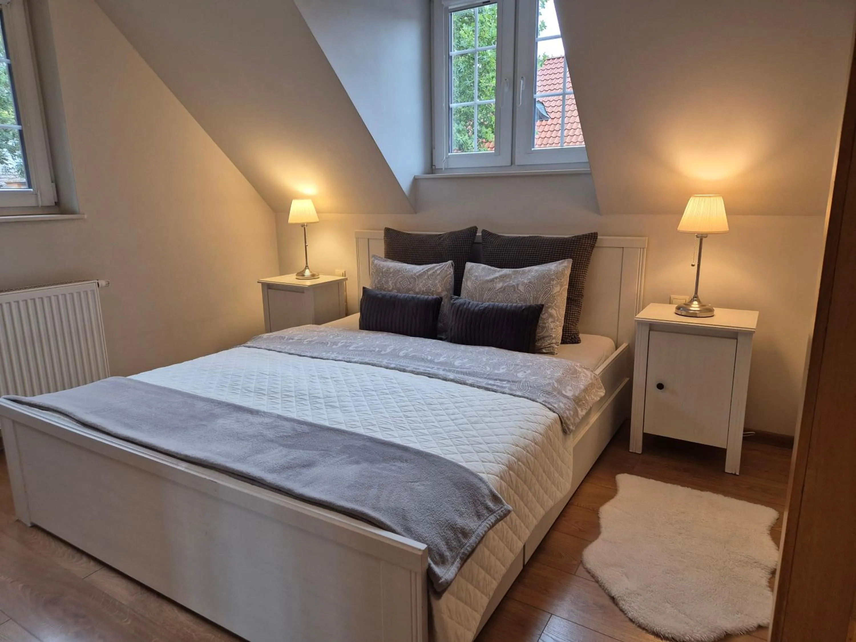 Bed in APARTAMENTY TUŹNIKOWIE