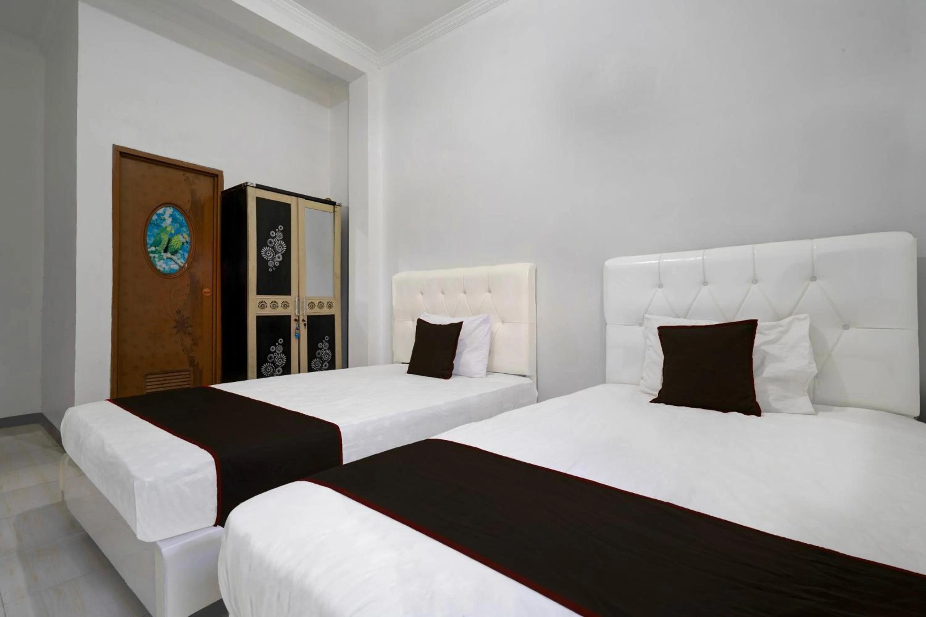 Delxue Twin Room in Hotel O 94843 Syariah Hj. Lilis Sukabumi