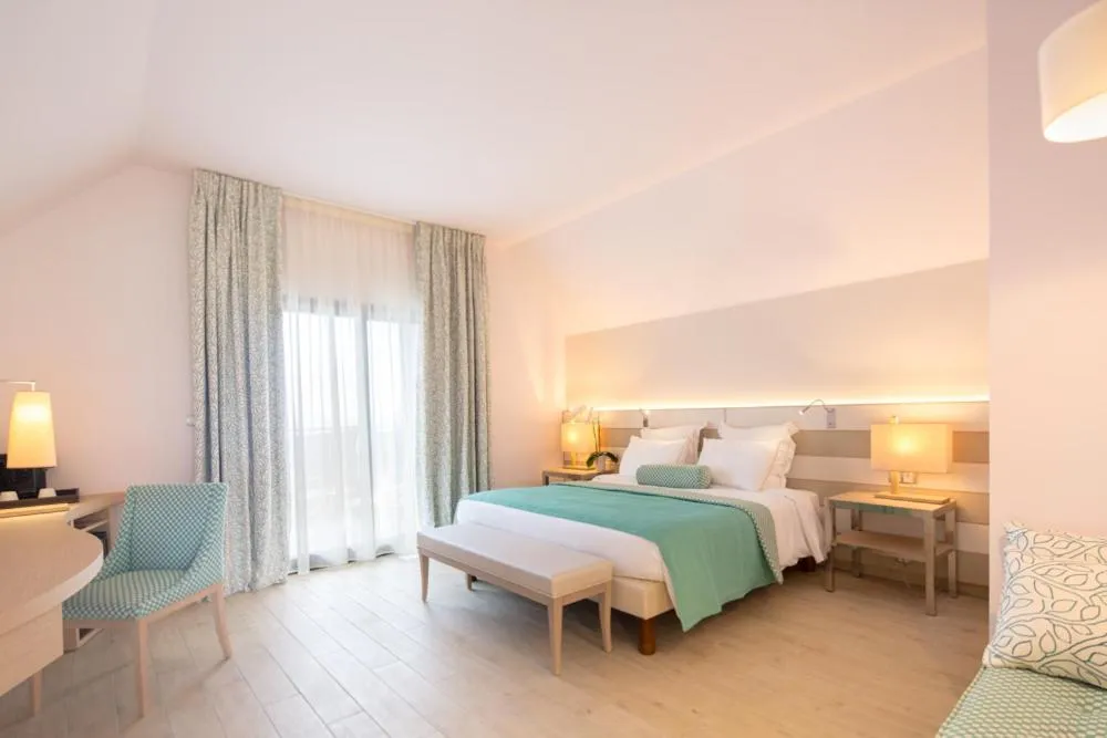 Bed in Akoya Hotel & Spa