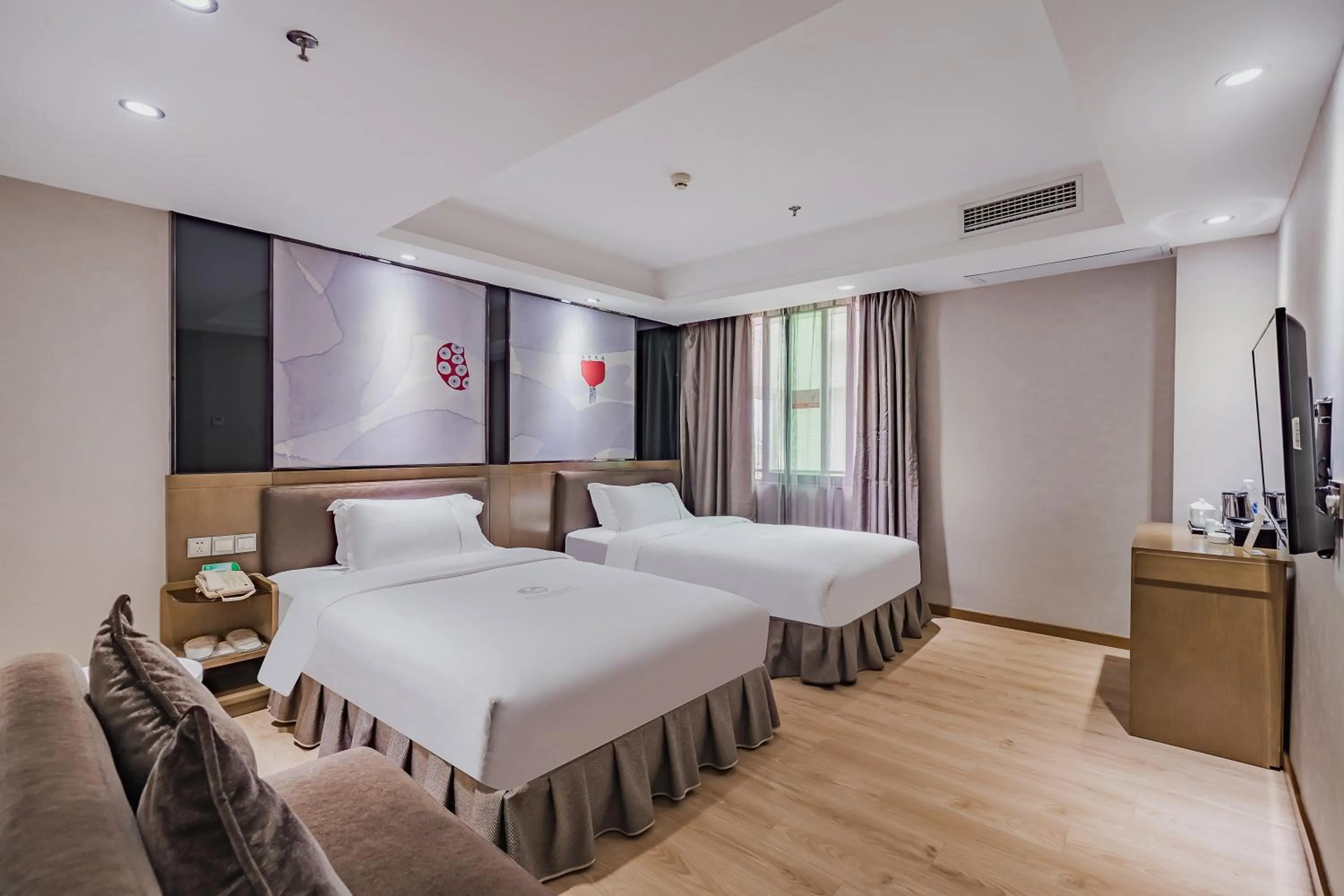 Photo of the whole room, Bed in Insail Hotels (Pazhou Exhibition Center KeCun Metro Station Dunhe Road Branch Guangzhou)