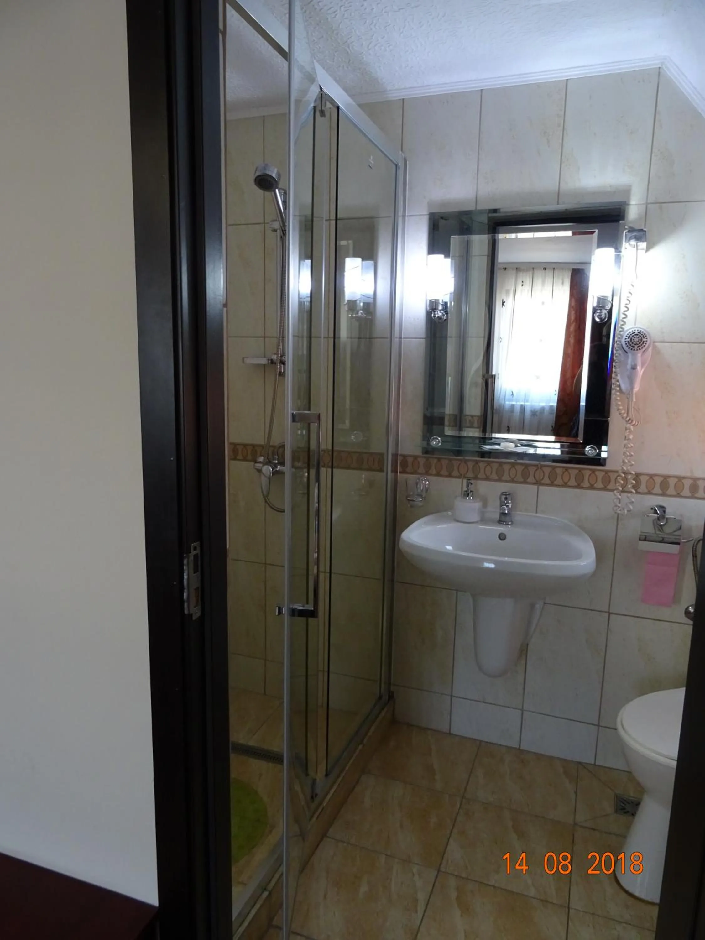 Bathroom in Pensiunea Magnolia