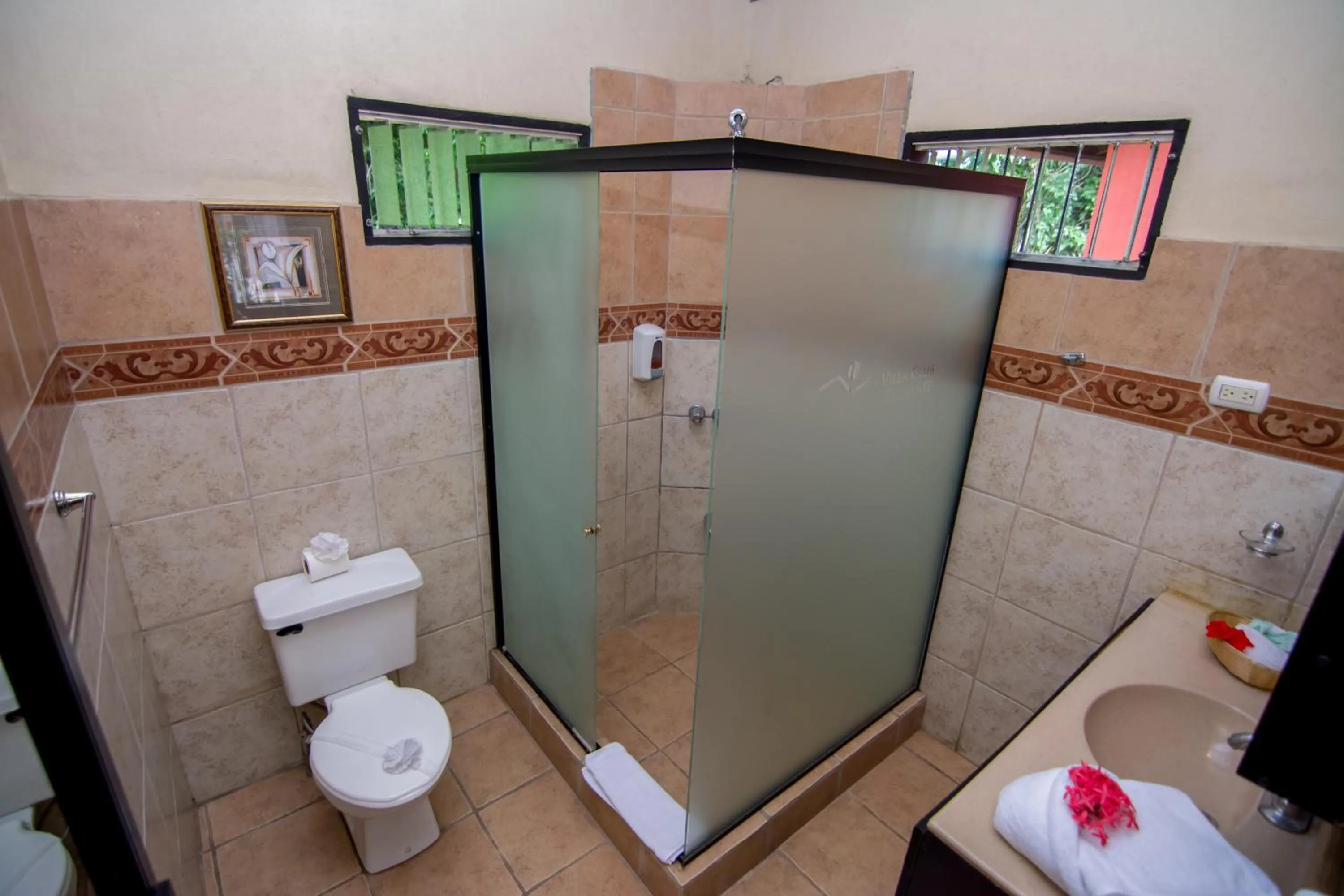 Toilet in Pacific Paradise Resort
