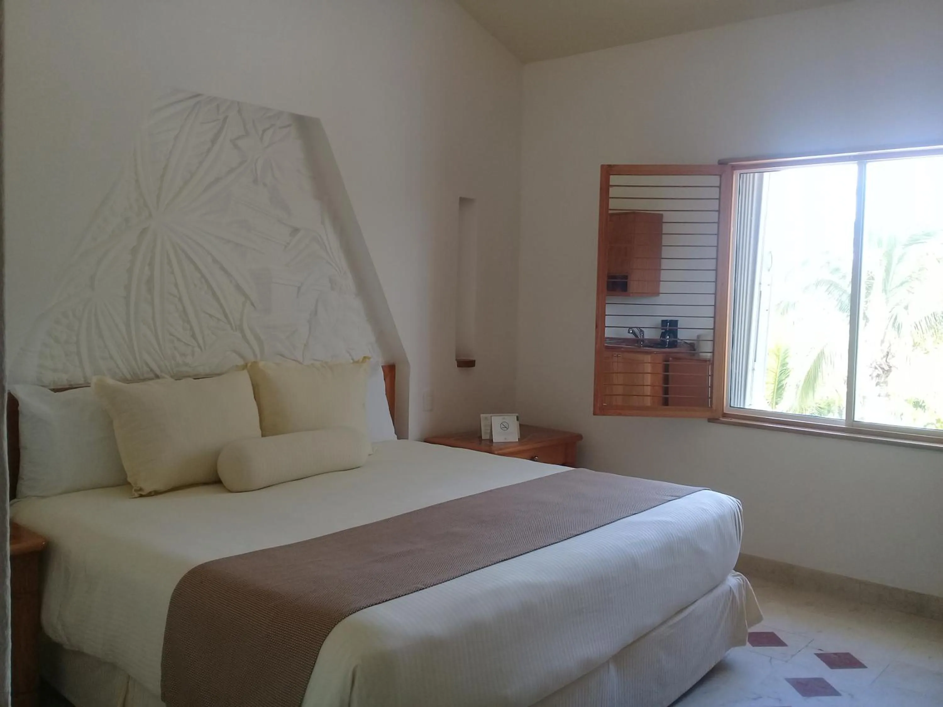 Bed in Sunset Fishermen Beach Resort - All Inclusive