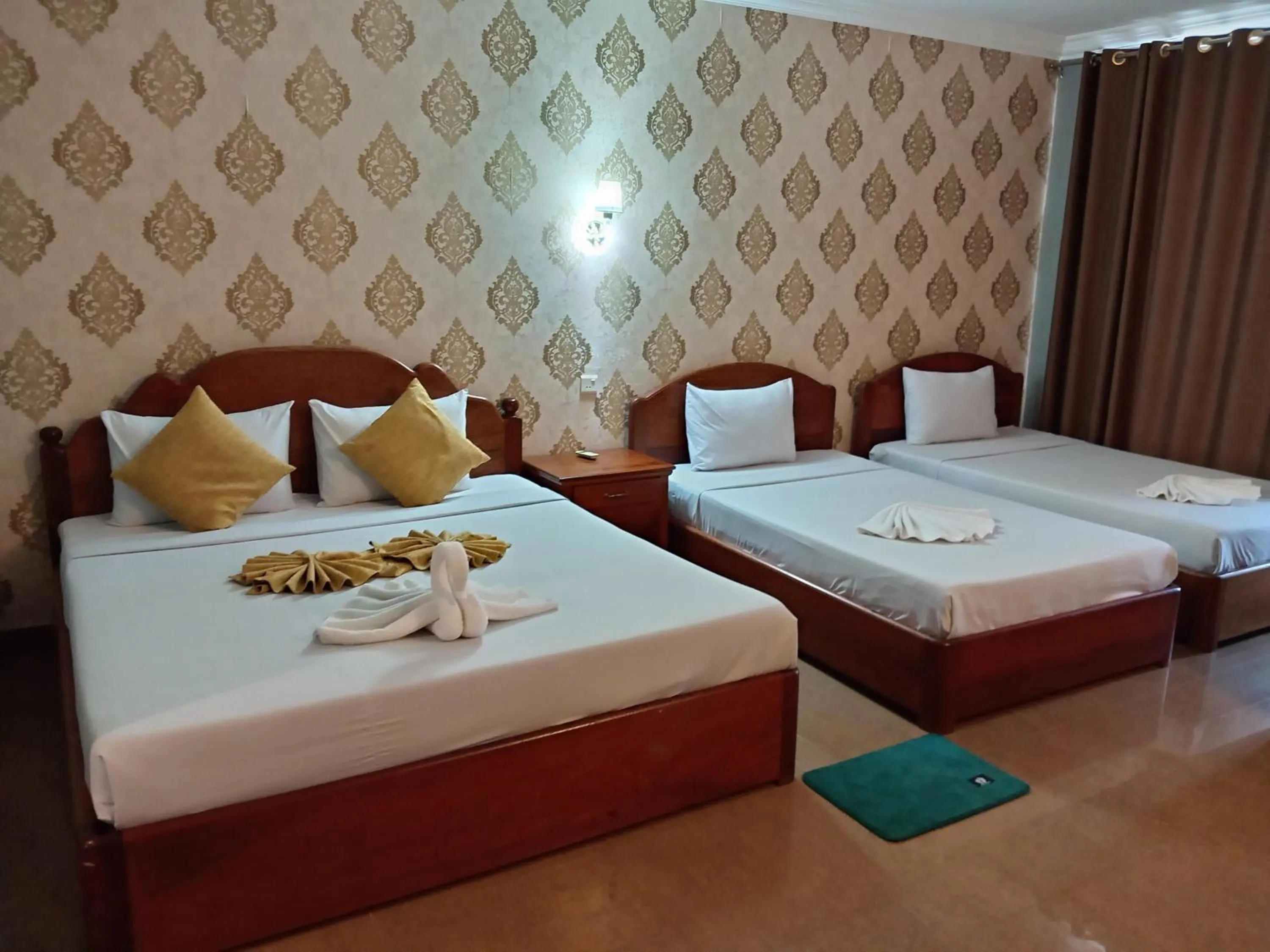 Bed in RatanakCity hotel