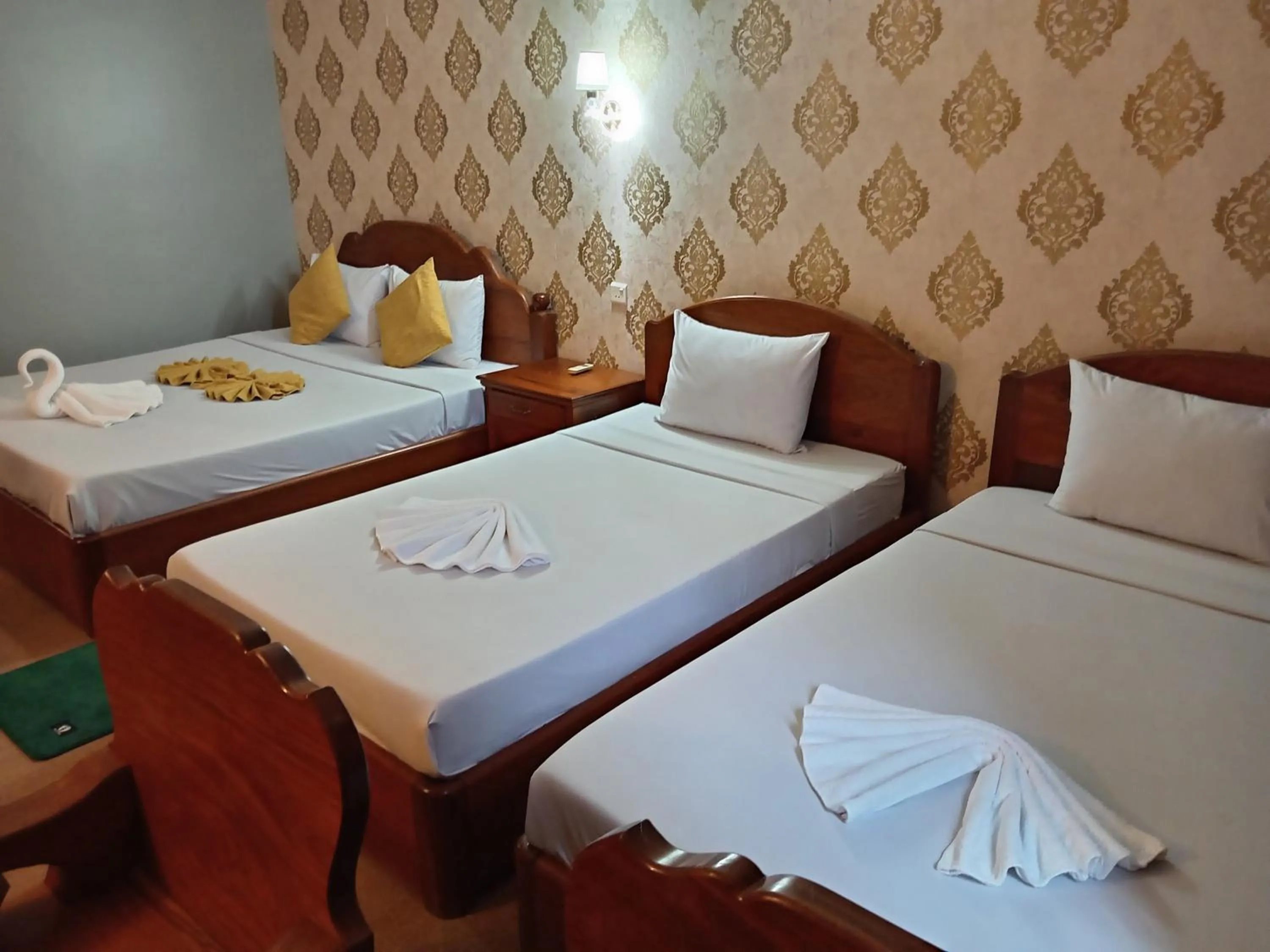 Bed in RatanakCity hotel