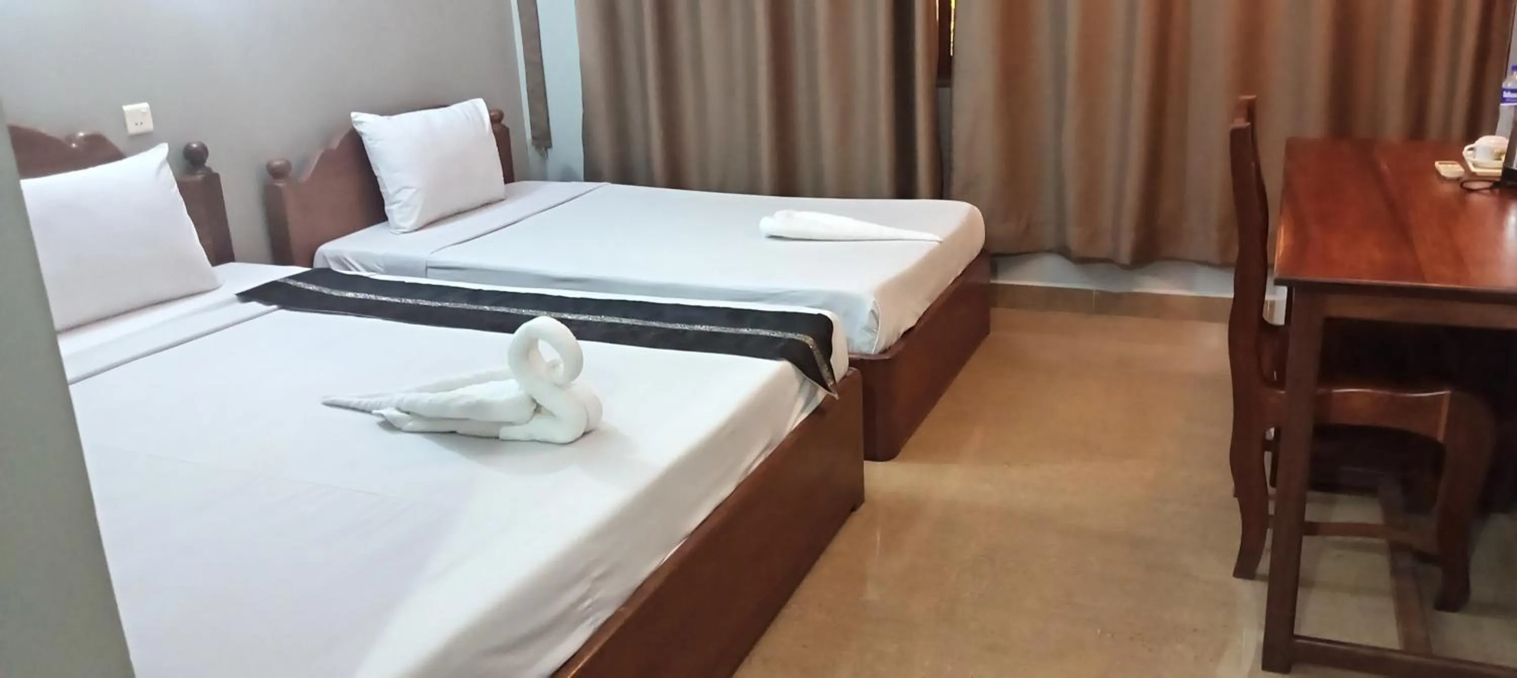 Bed in RatanakCity hotel