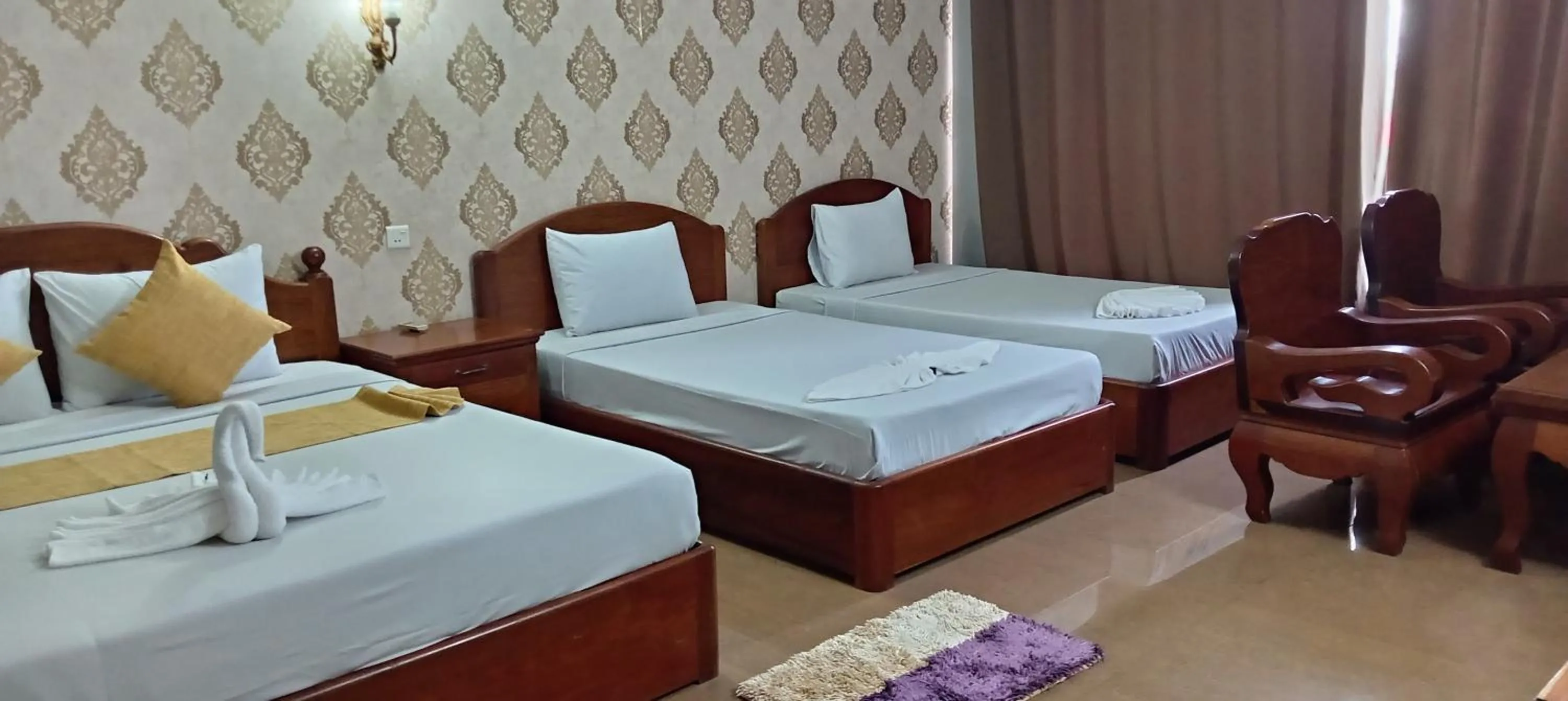 Bed in RatanakCity hotel