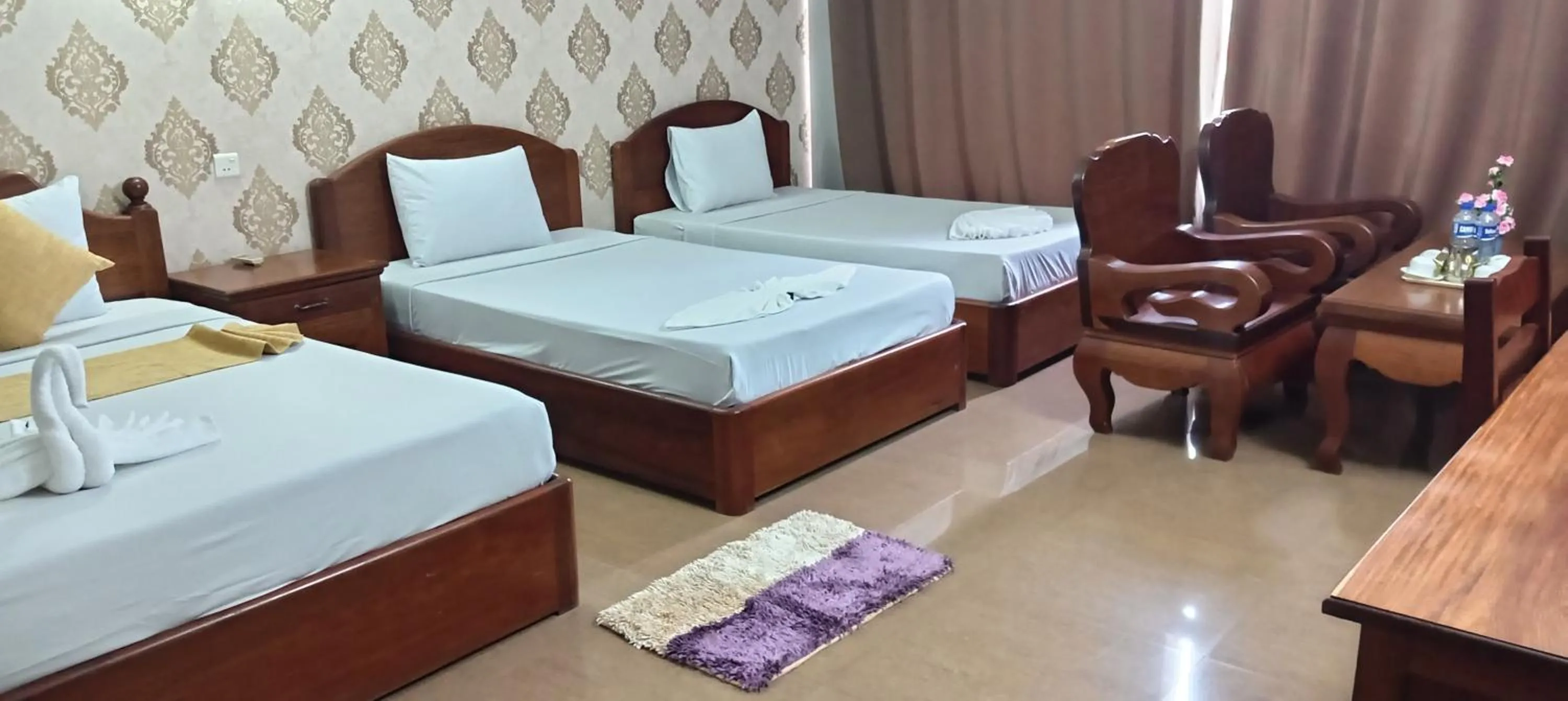 Bed in RatanakCity hotel