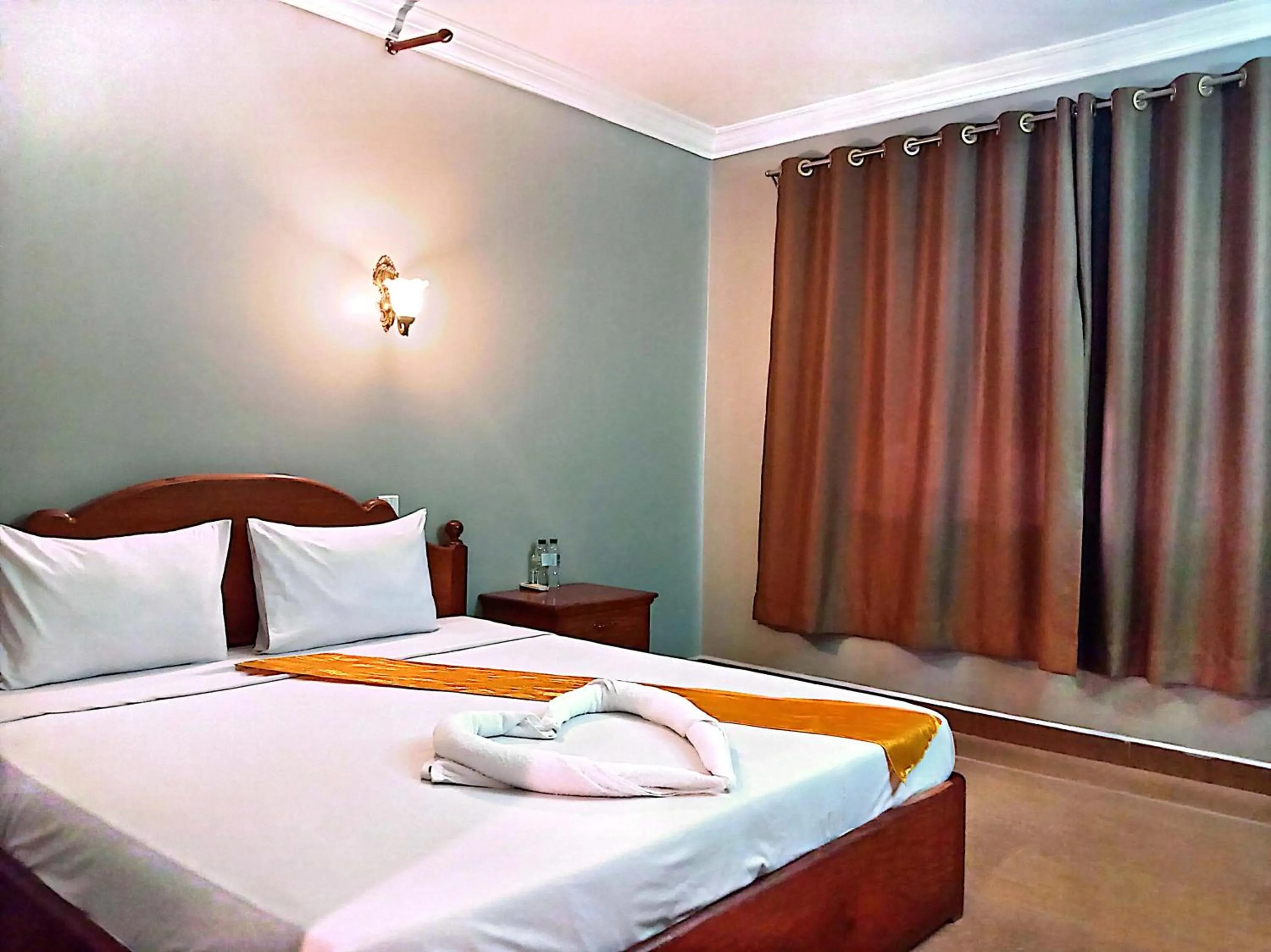 Bed in RatanakCity hotel