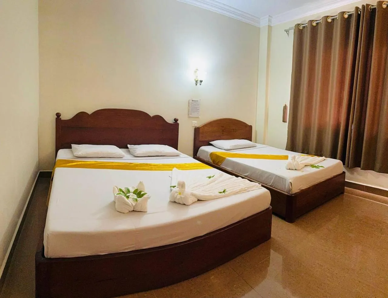 Bed in RatanakCity hotel