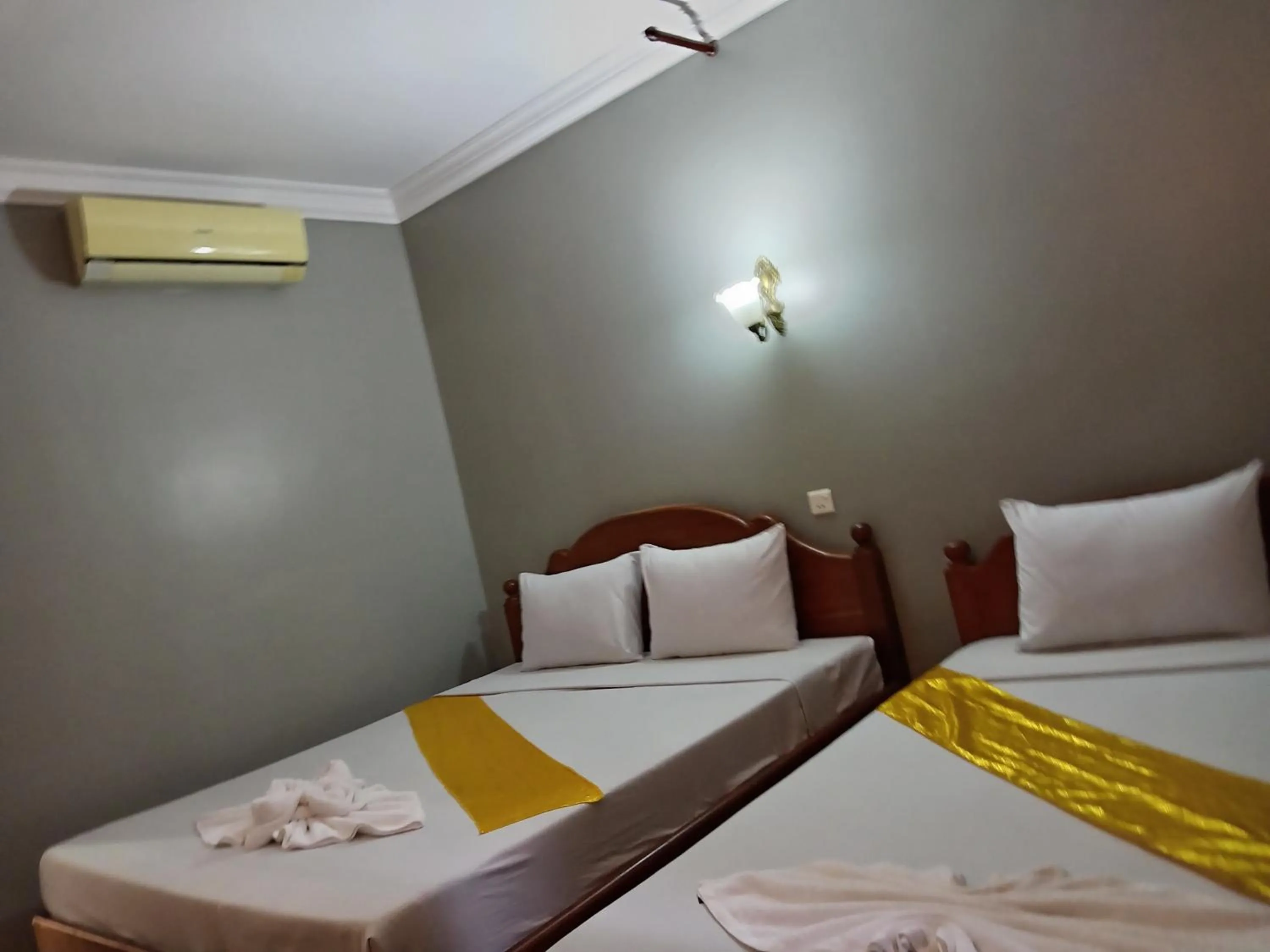 Bed in RatanakCity hotel