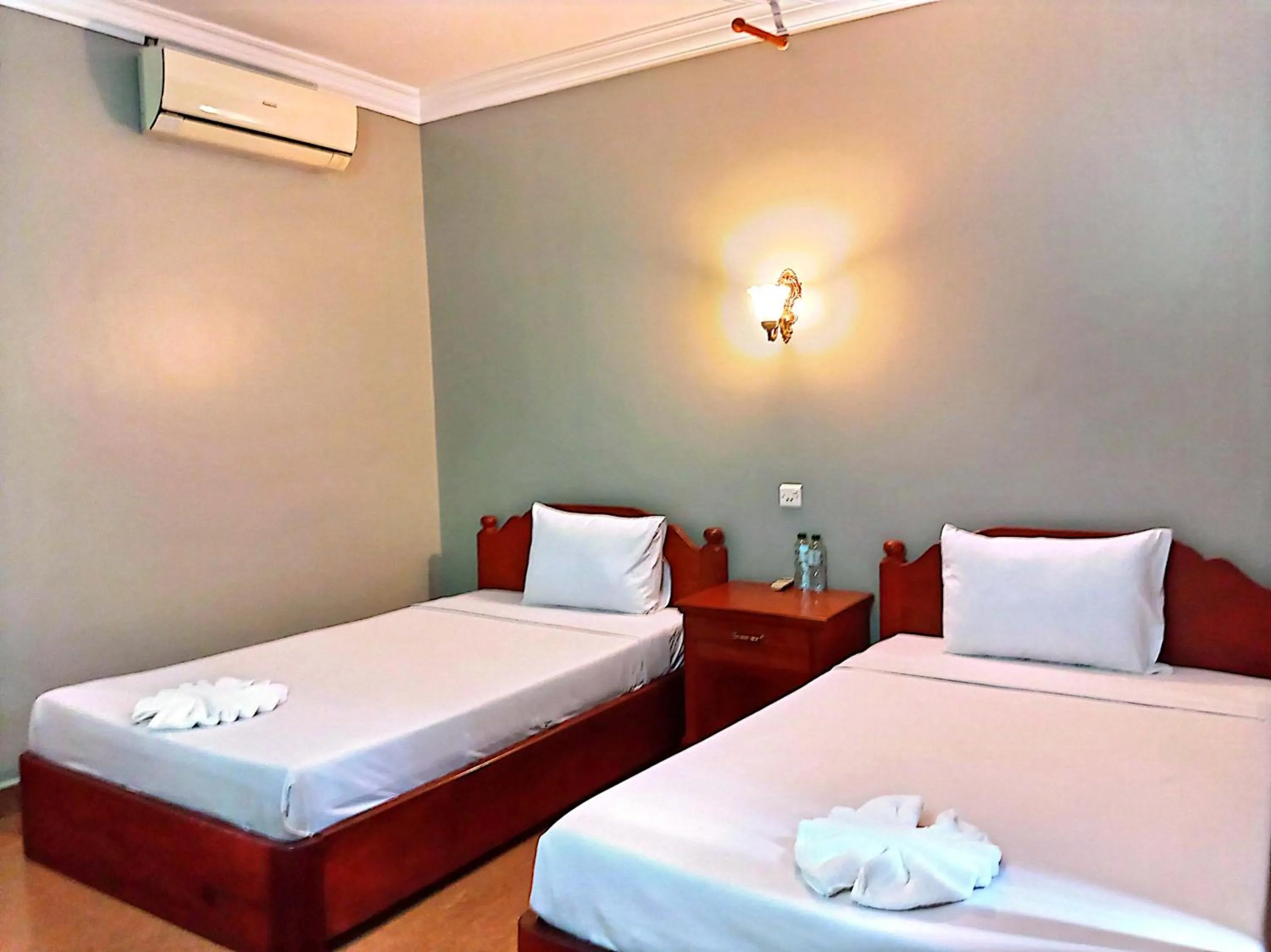 Bed in RatanakCity hotel