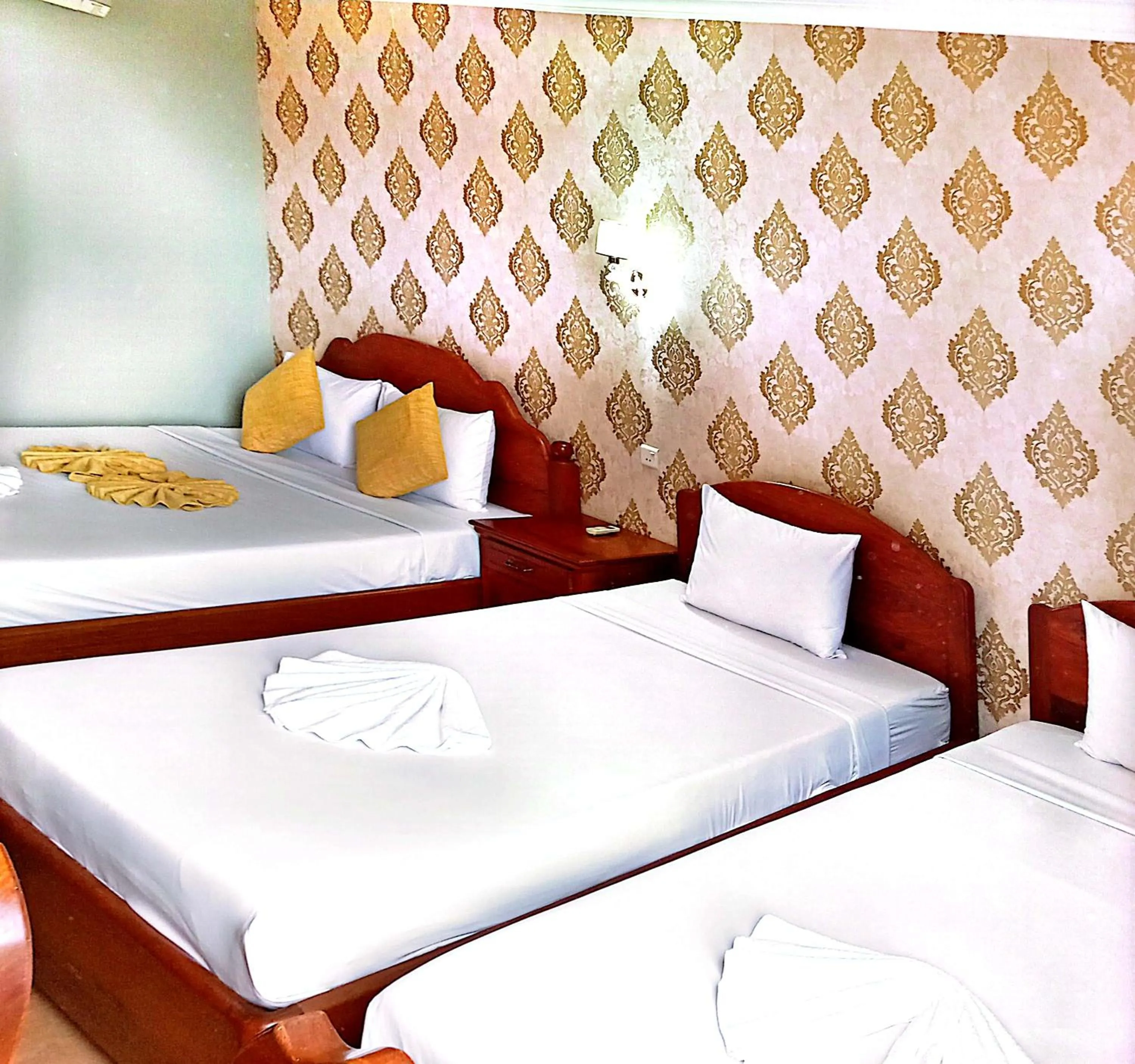Bed in RatanakCity hotel