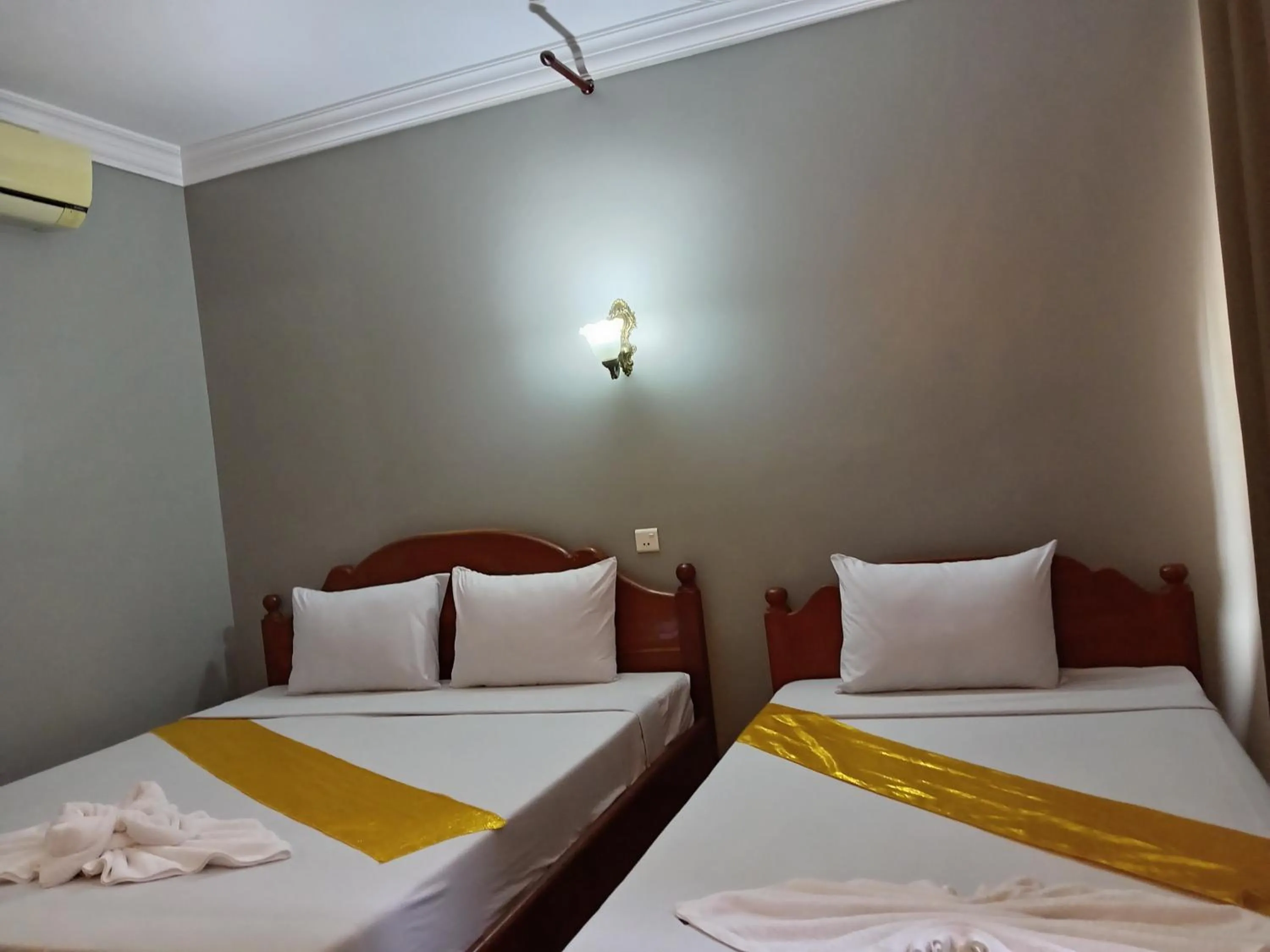 Bed in RatanakCity hotel