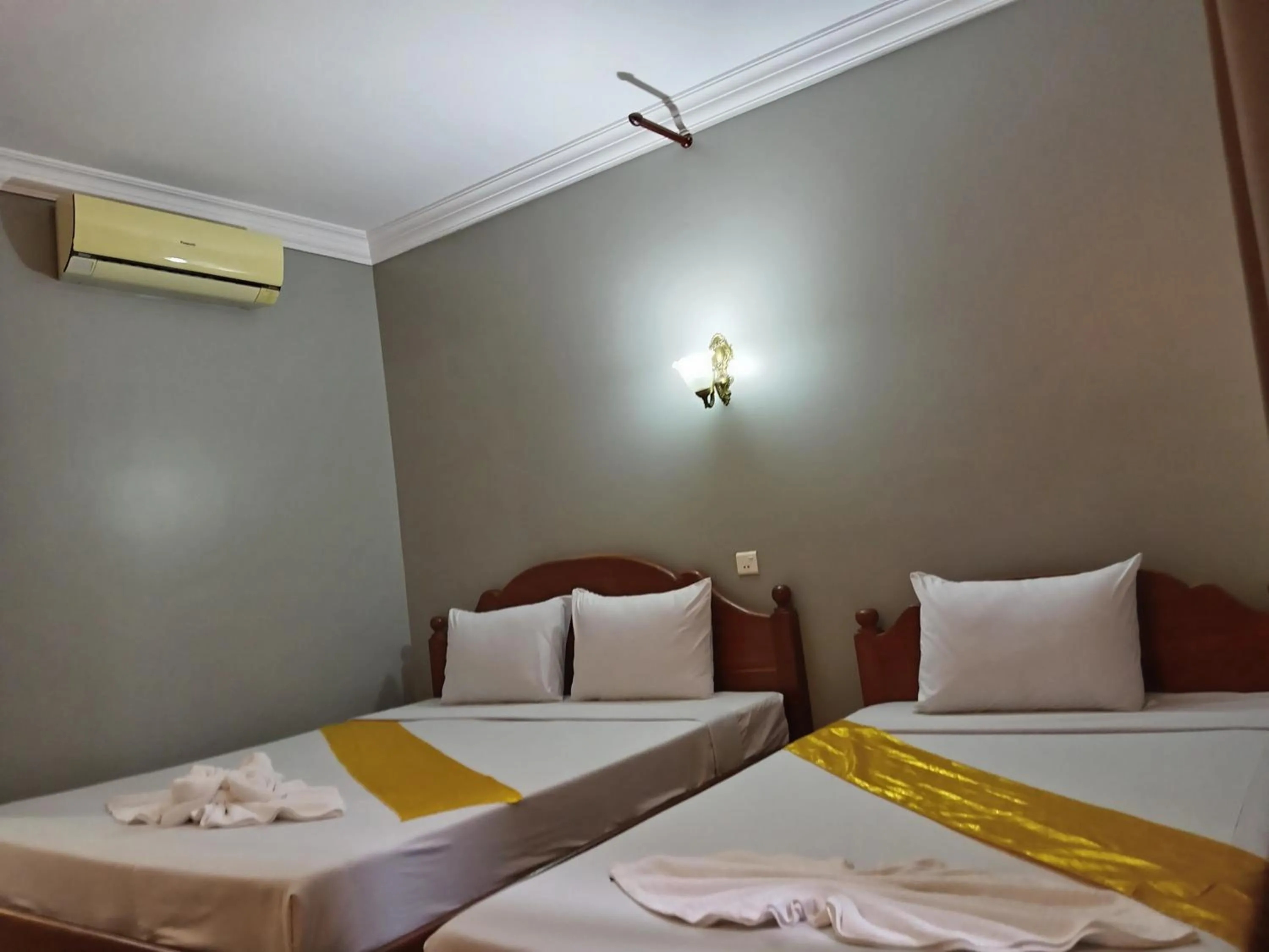 Bed in RatanakCity hotel