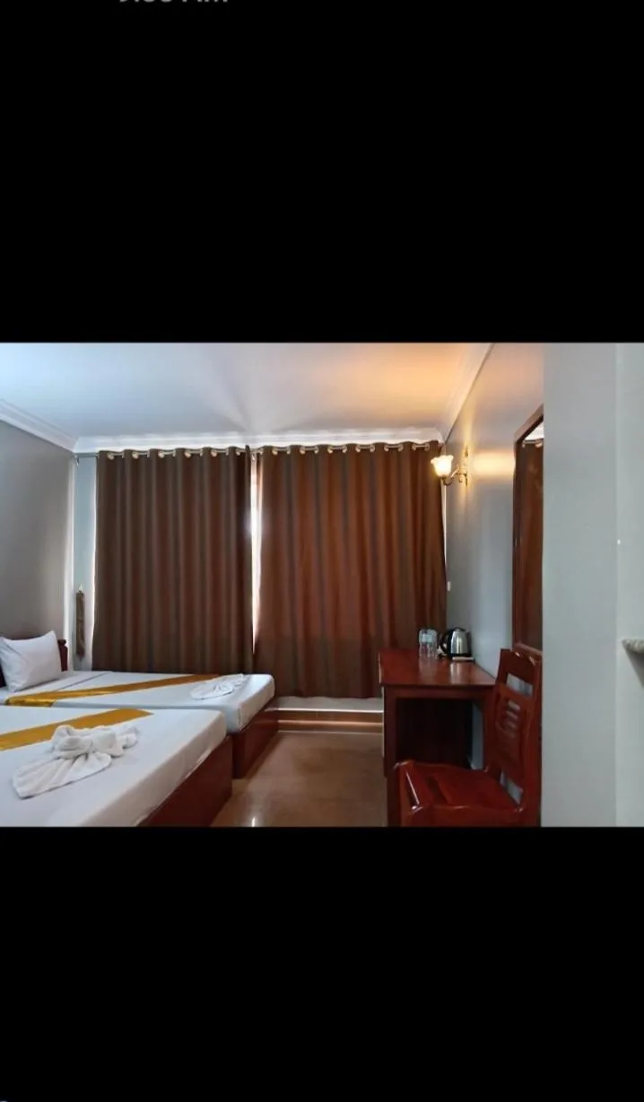 Bed in RatanakCity hotel