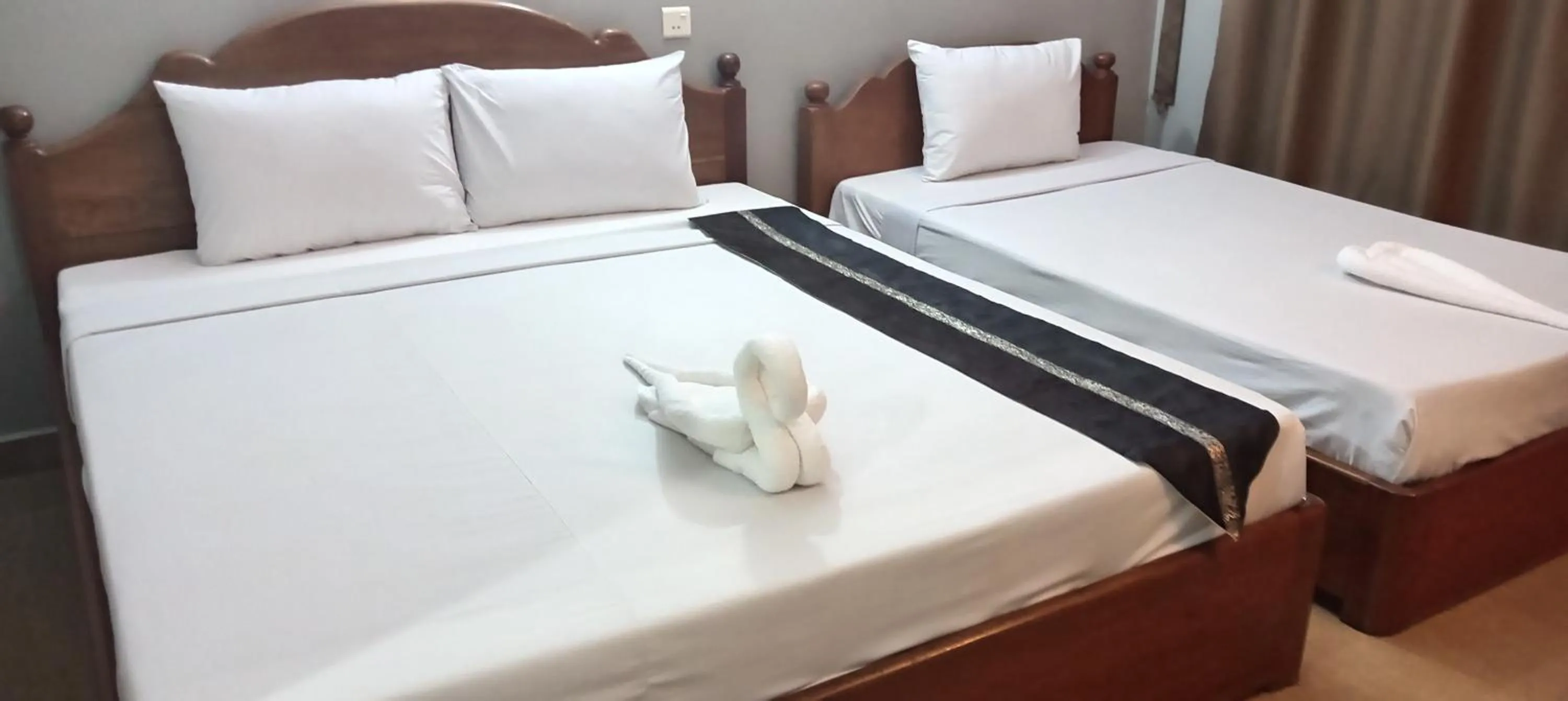 Bed in RatanakCity hotel