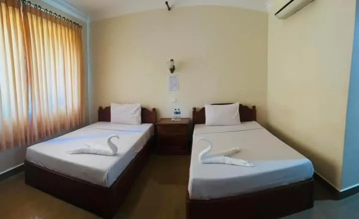 Bed in RatanakCity hotel