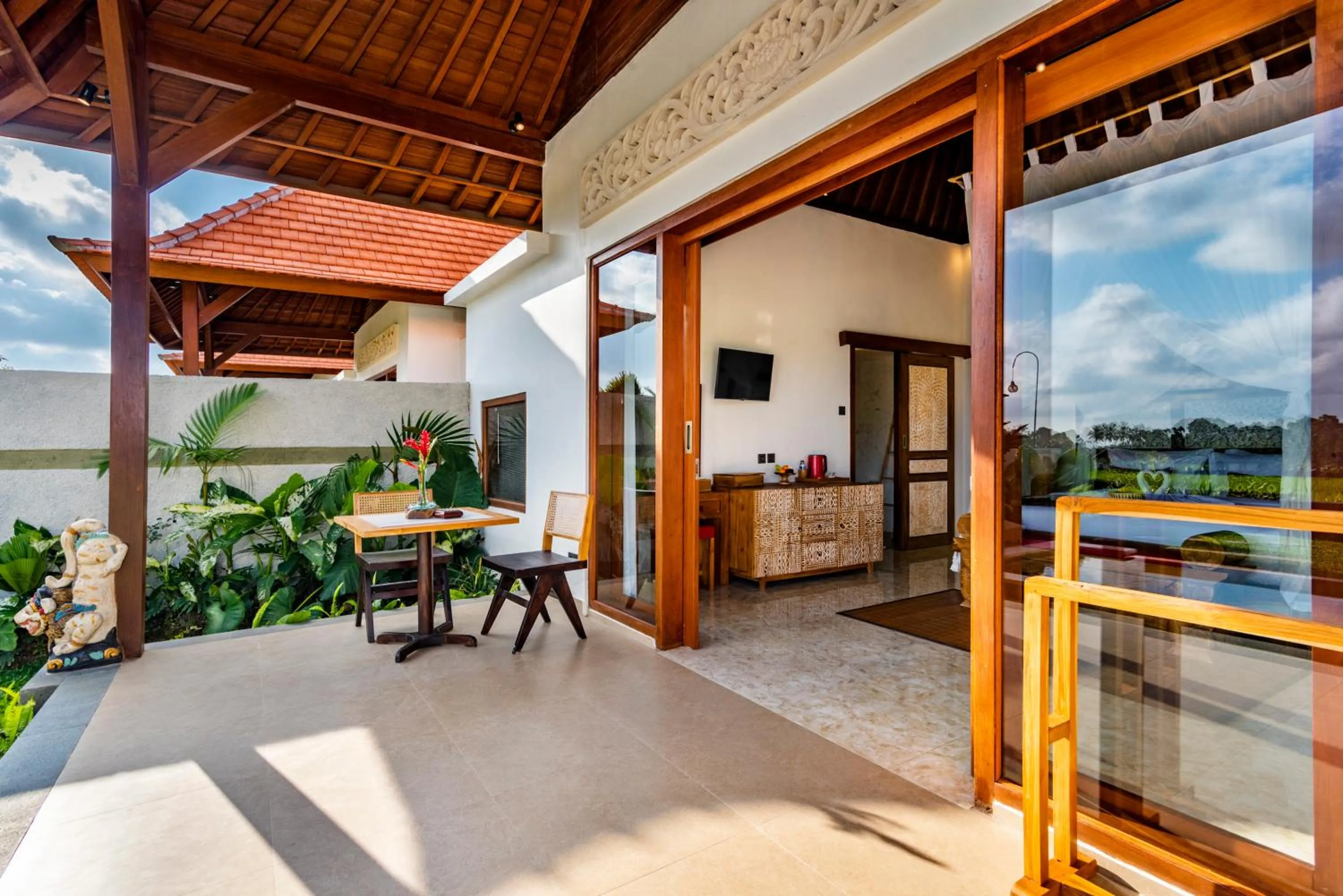 Seating area in Akshaya Resort Ubud by Dhananjaya Hospitality