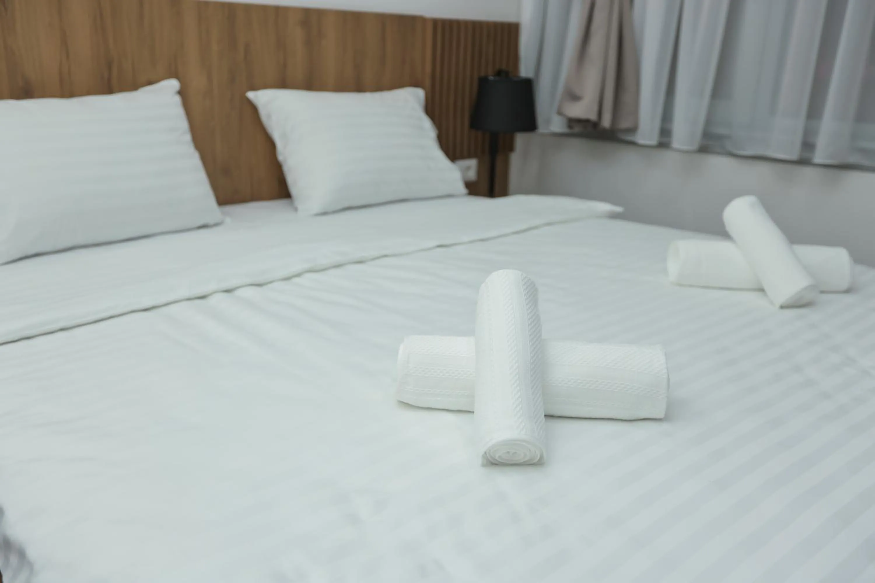 Bed in Hotel Riverside