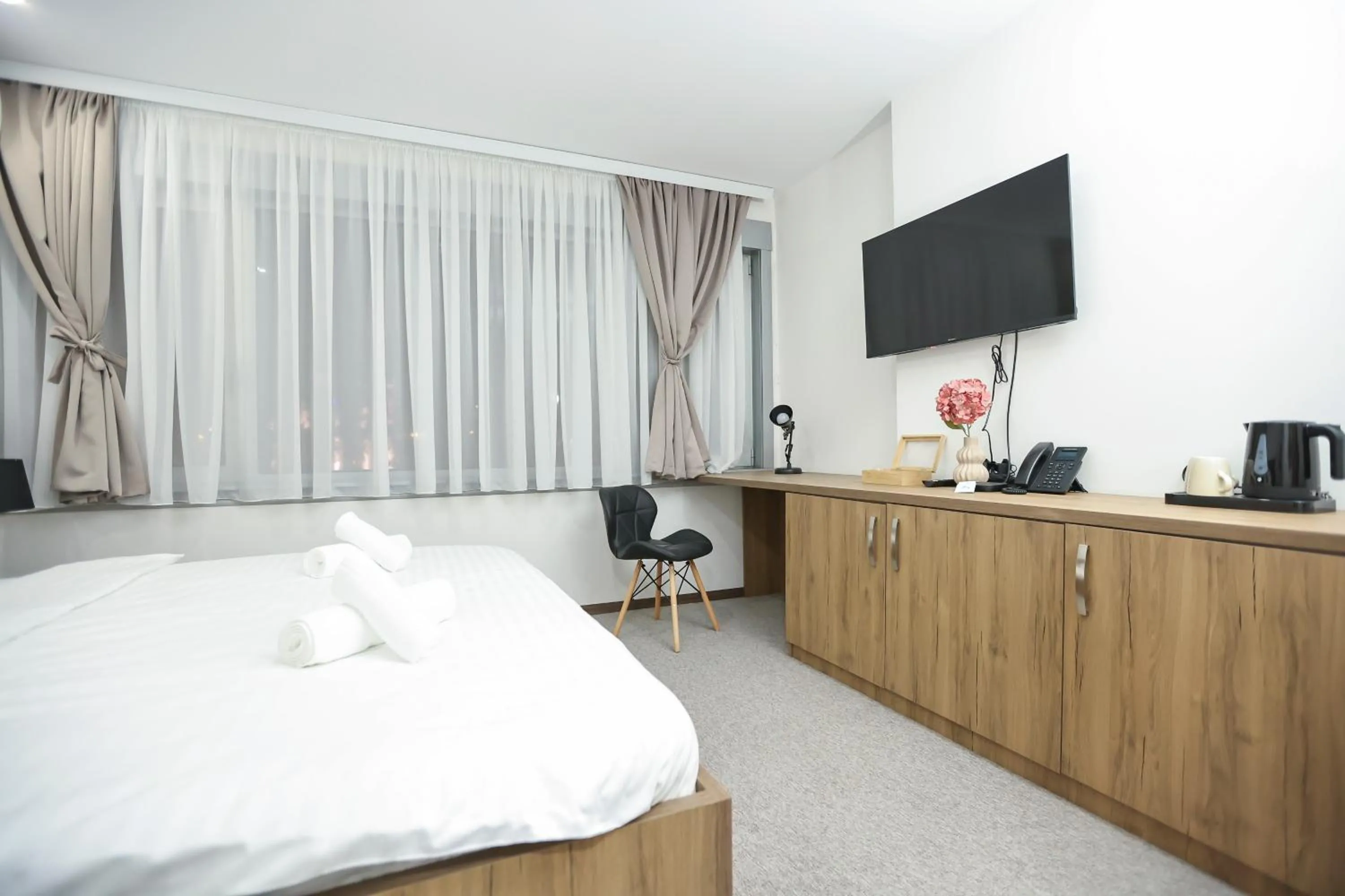 Bed in Hotel Riverside