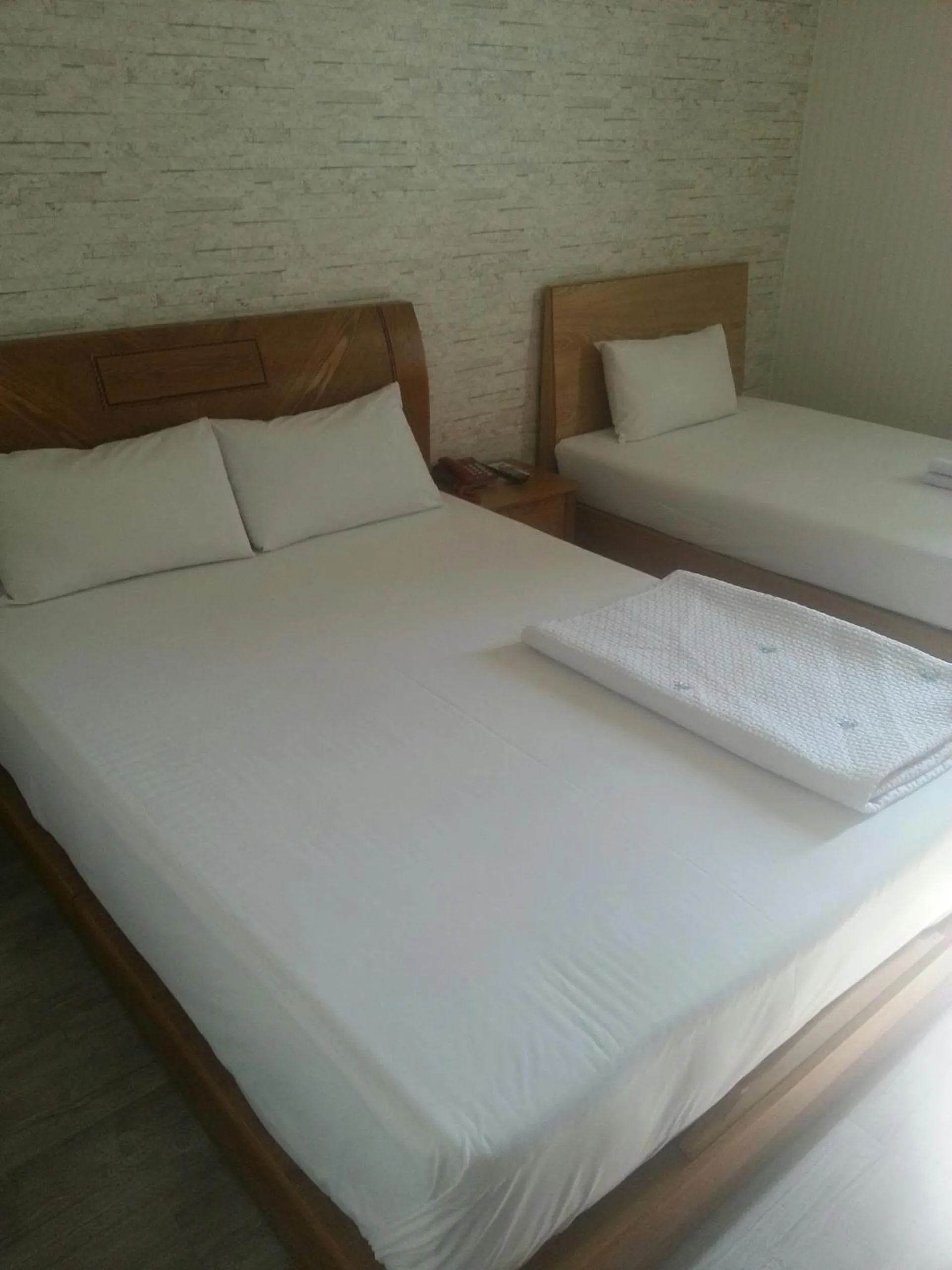 Bedroom, Bed in Hansol Hotel